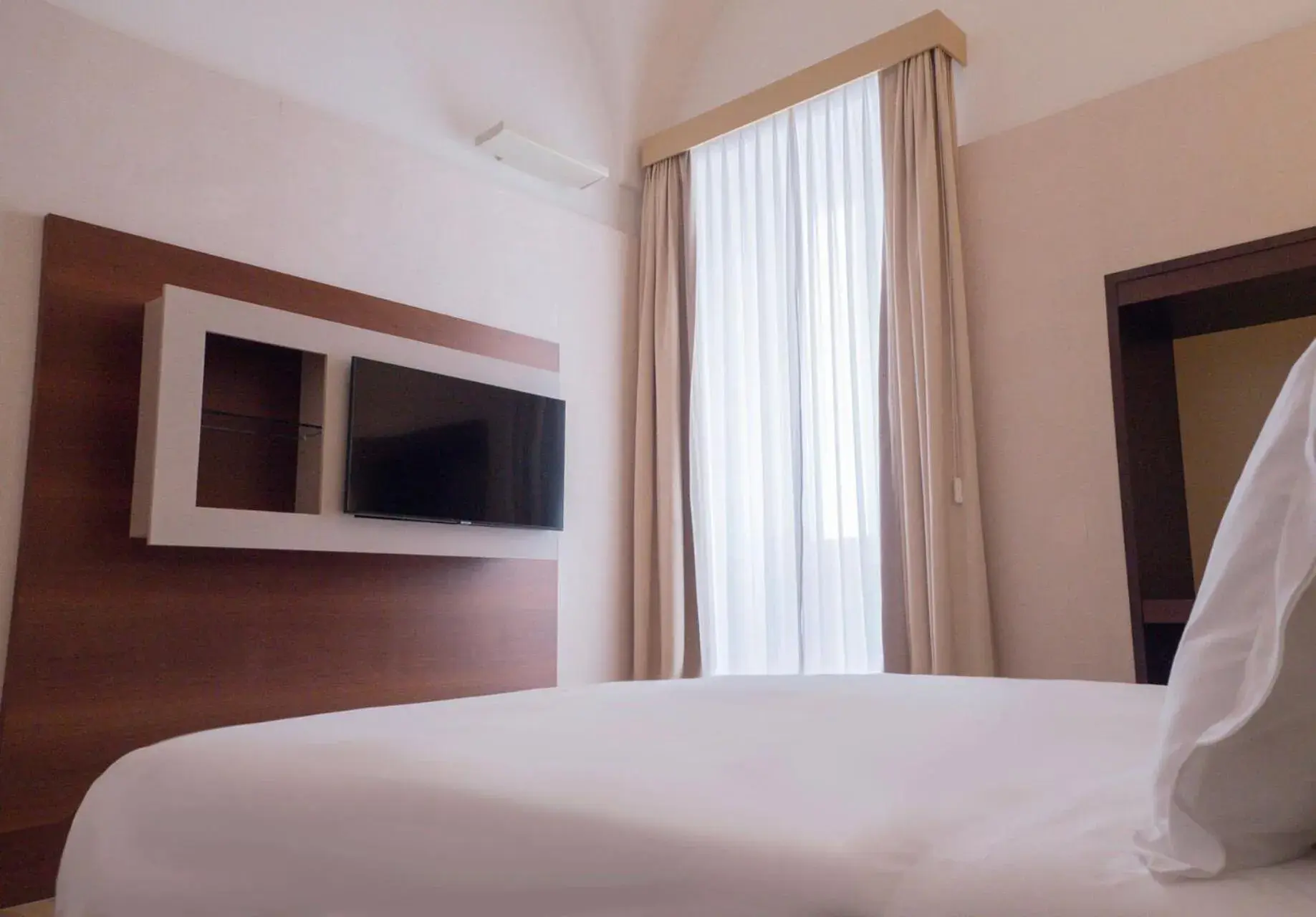 TV and multimedia, Bed in Risorgimento Resort TV and multimedia, Bed in Risorgimento Resort