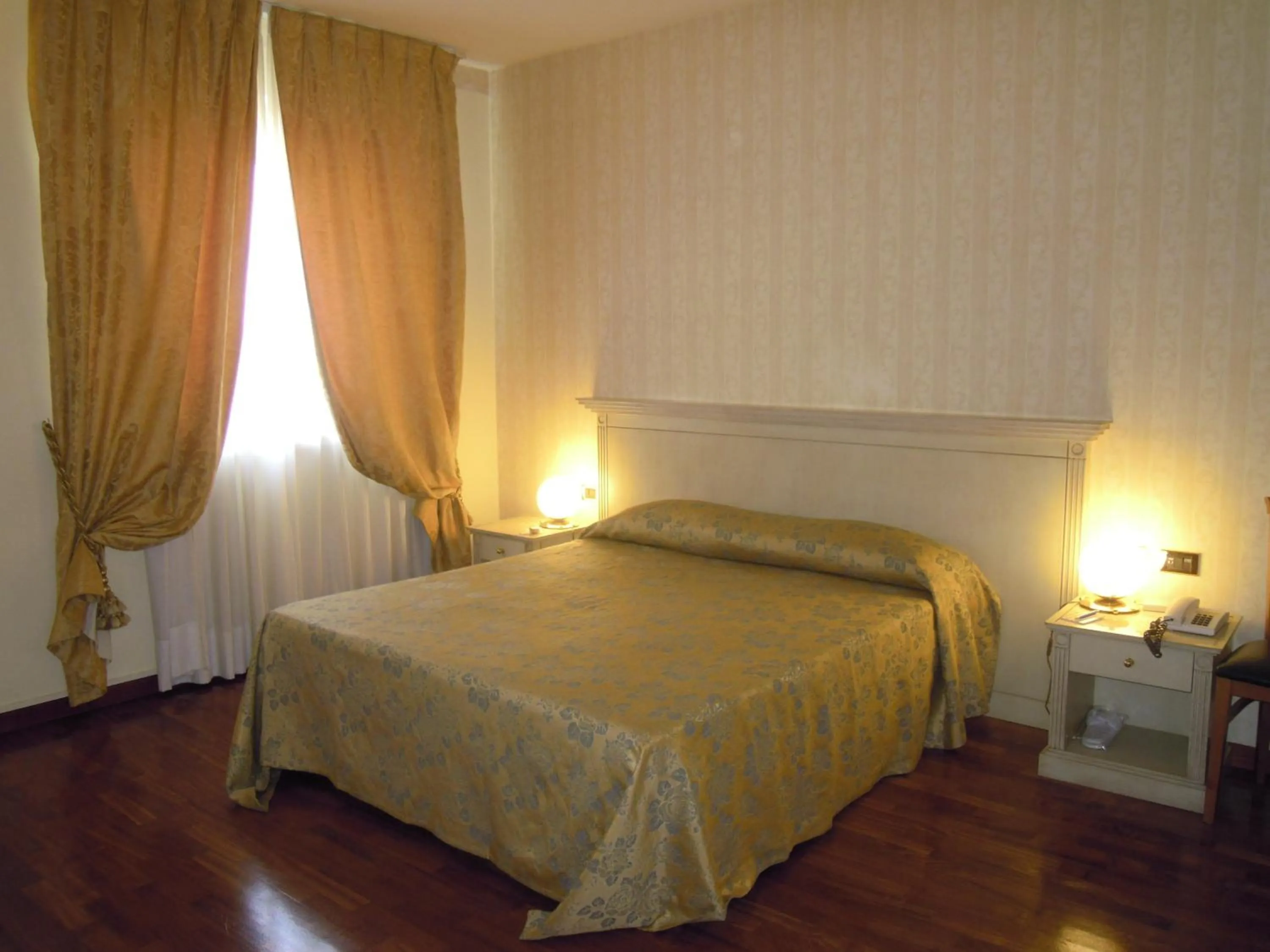 Bed in Hotel Villa Medici