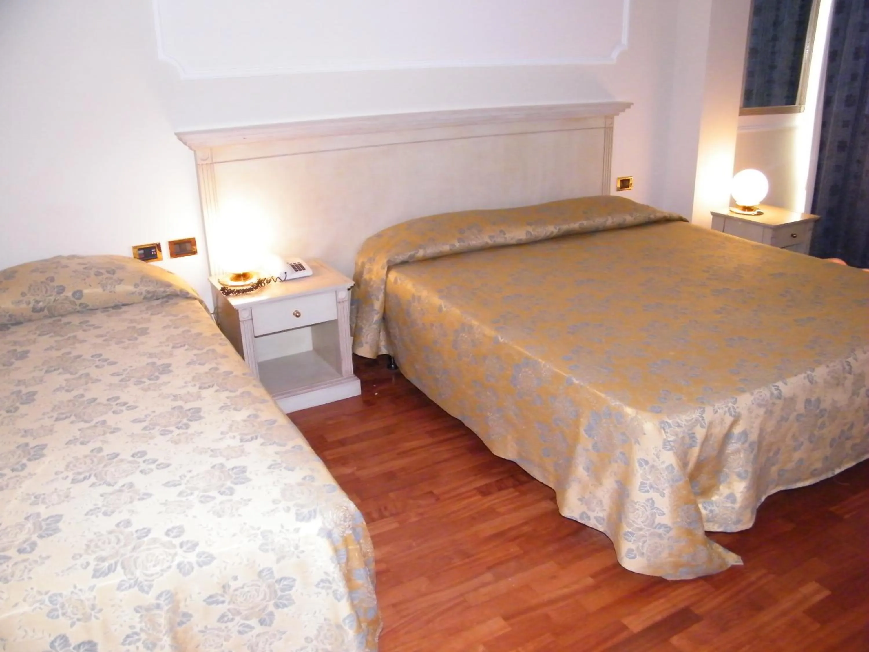 Bed in Hotel Villa Medici