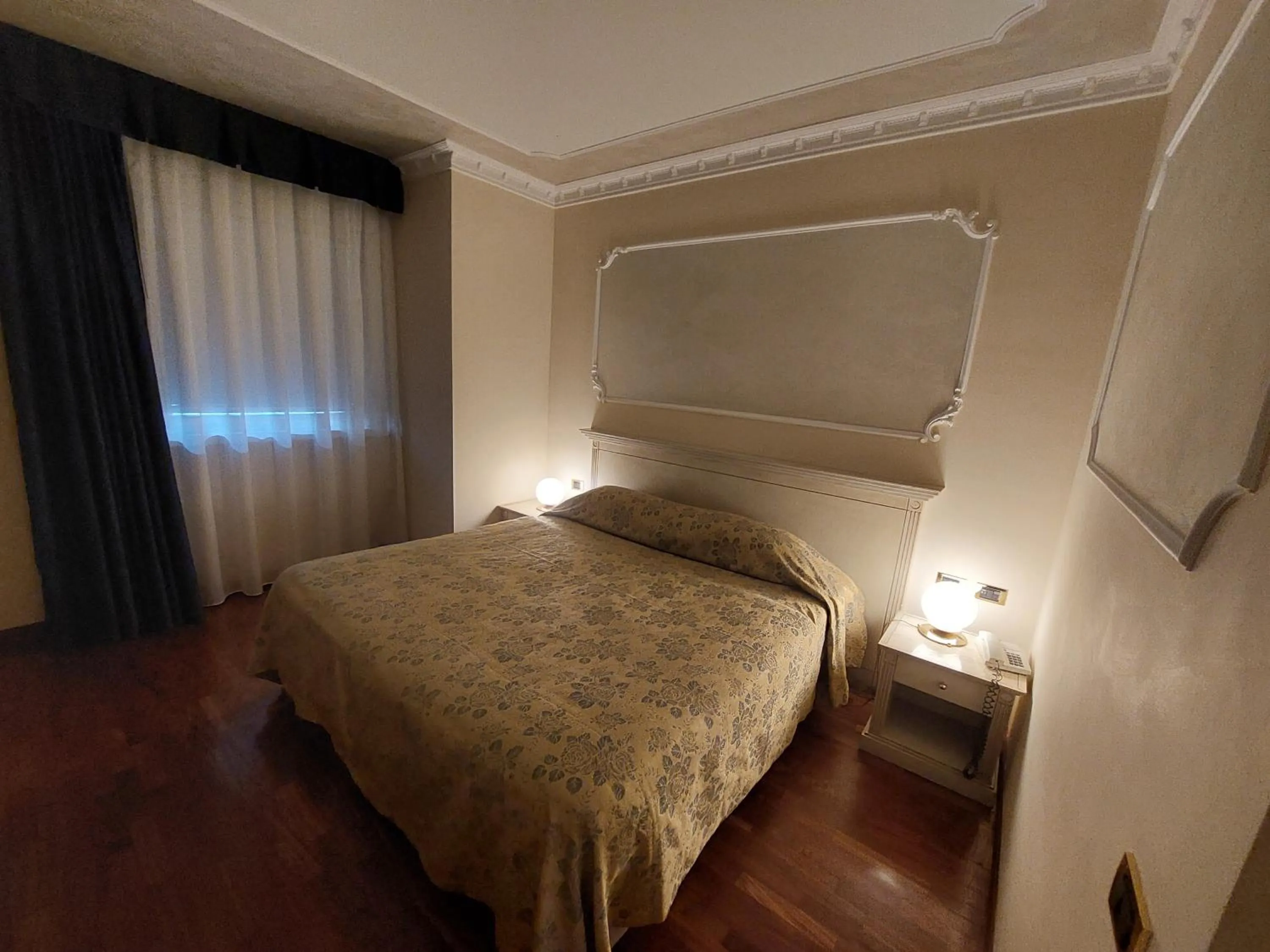 Bed in Hotel Villa Medici