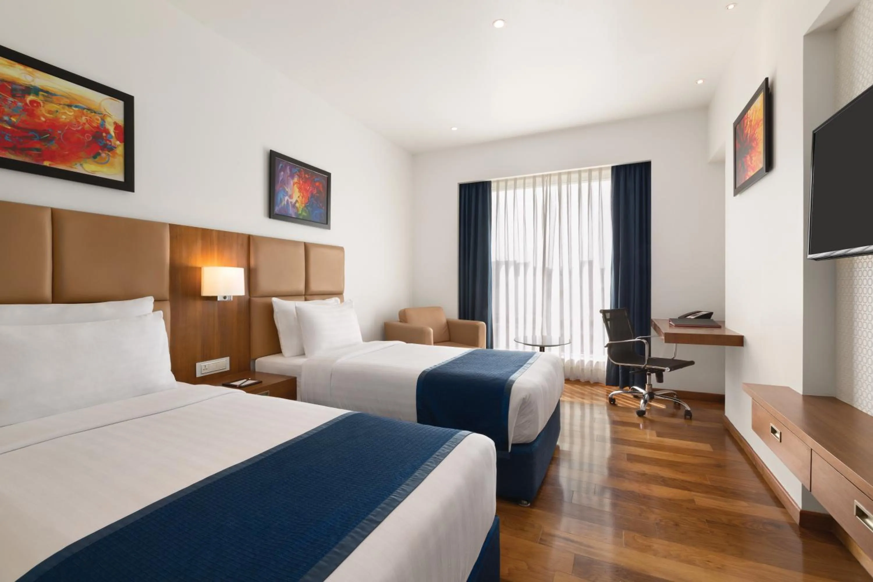 Photo of the whole room, Bed in Ramada Encore Domlur Bangalore