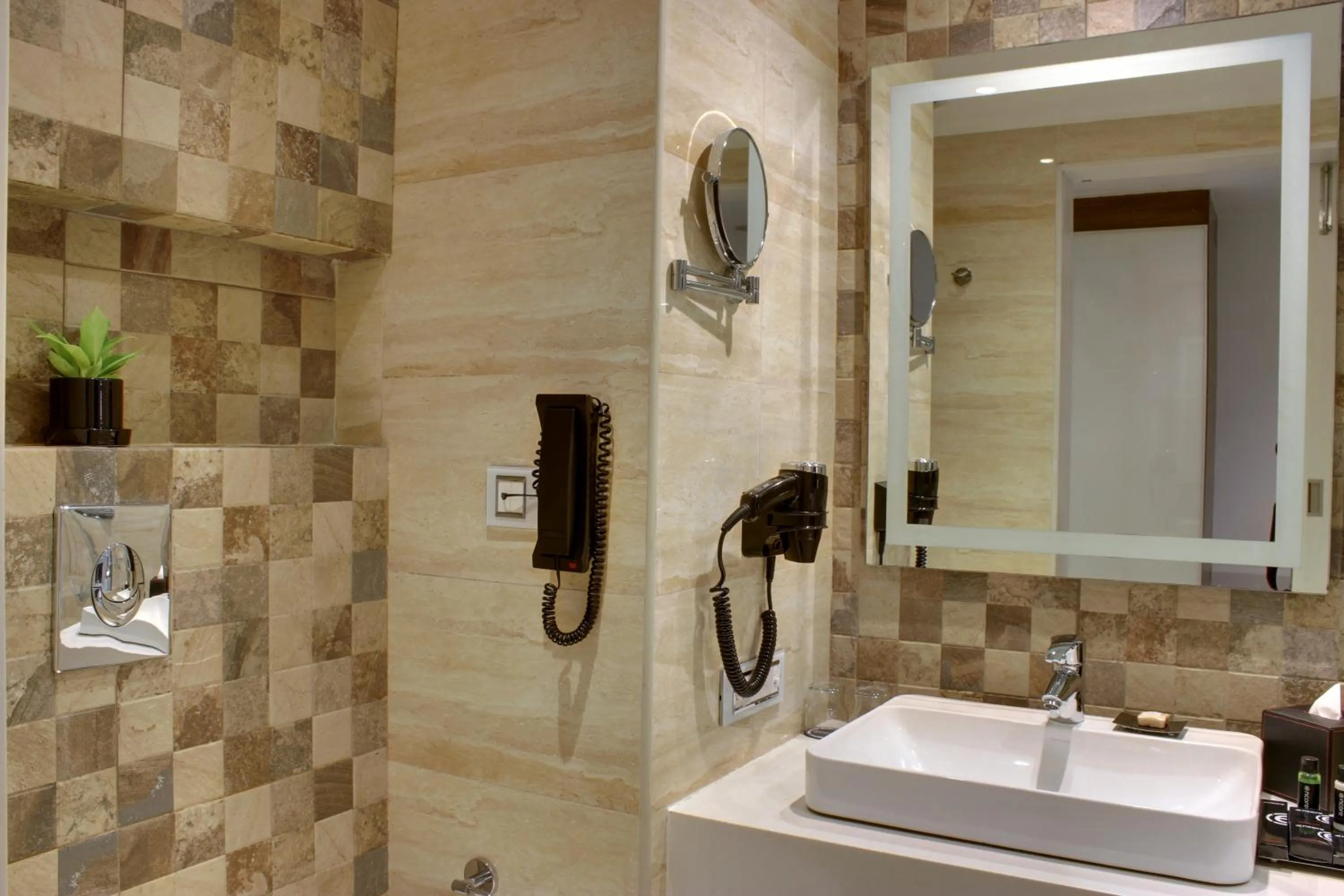 Bathroom in Ramada Encore Domlur Bangalore