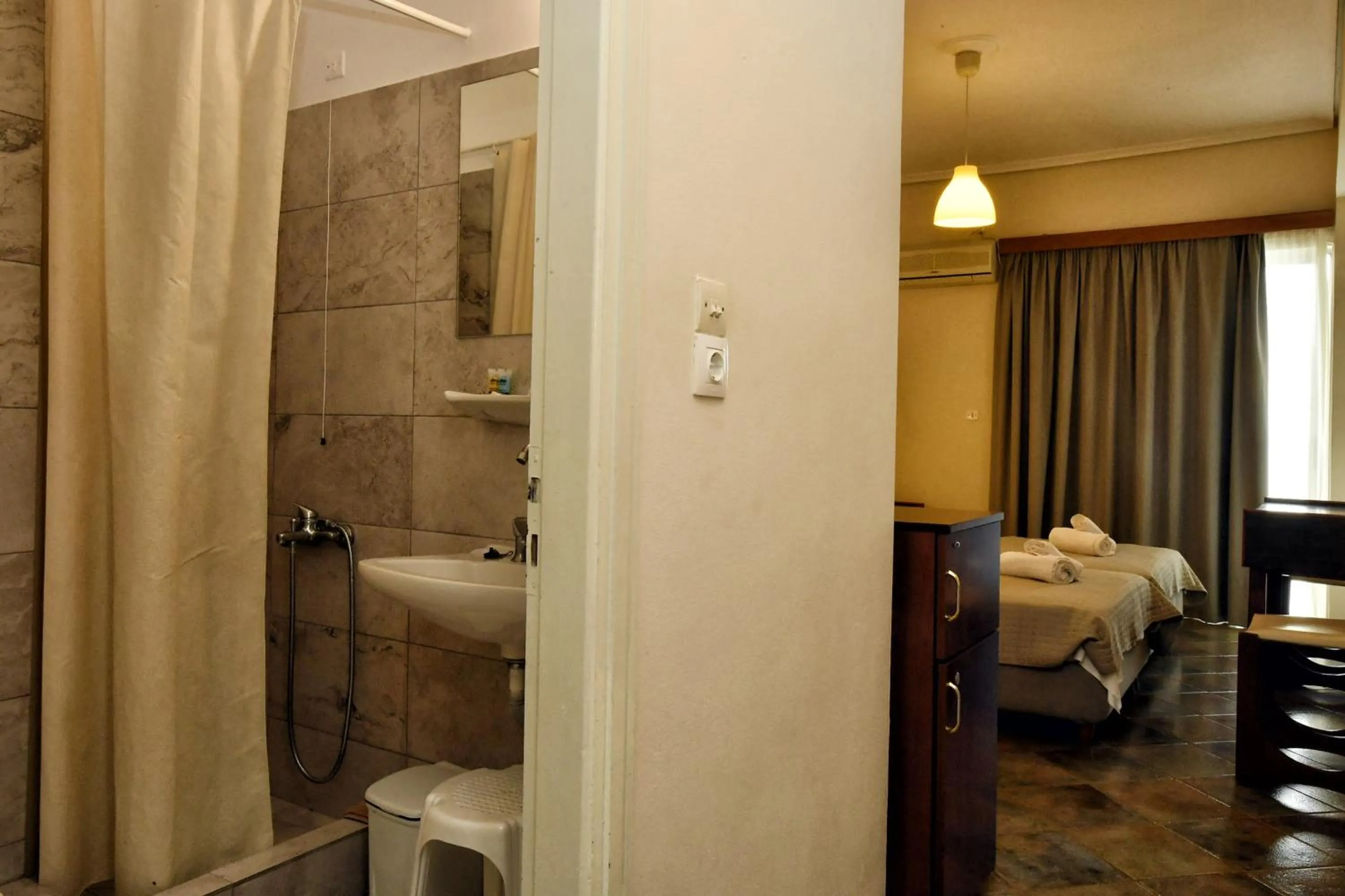 Photo of the whole room, Bed in Siagas Beach Hotel