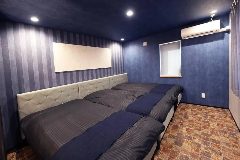 Bed in The BEEHIVE OTARU