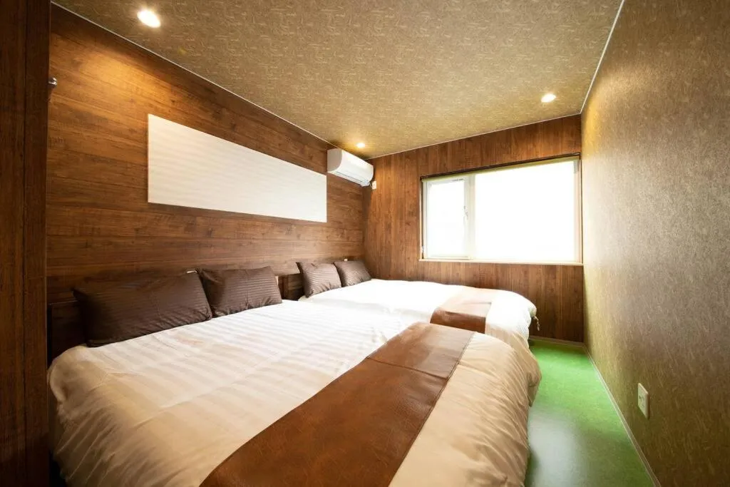 Bed in The BEEHIVE OTARU