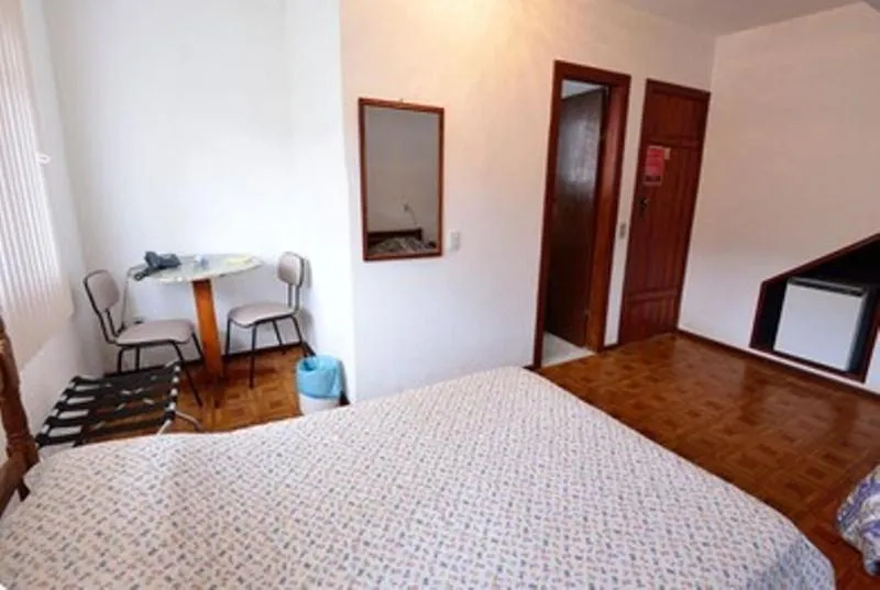 Photo of the whole room, Bed in Caparaó Parque Hotel