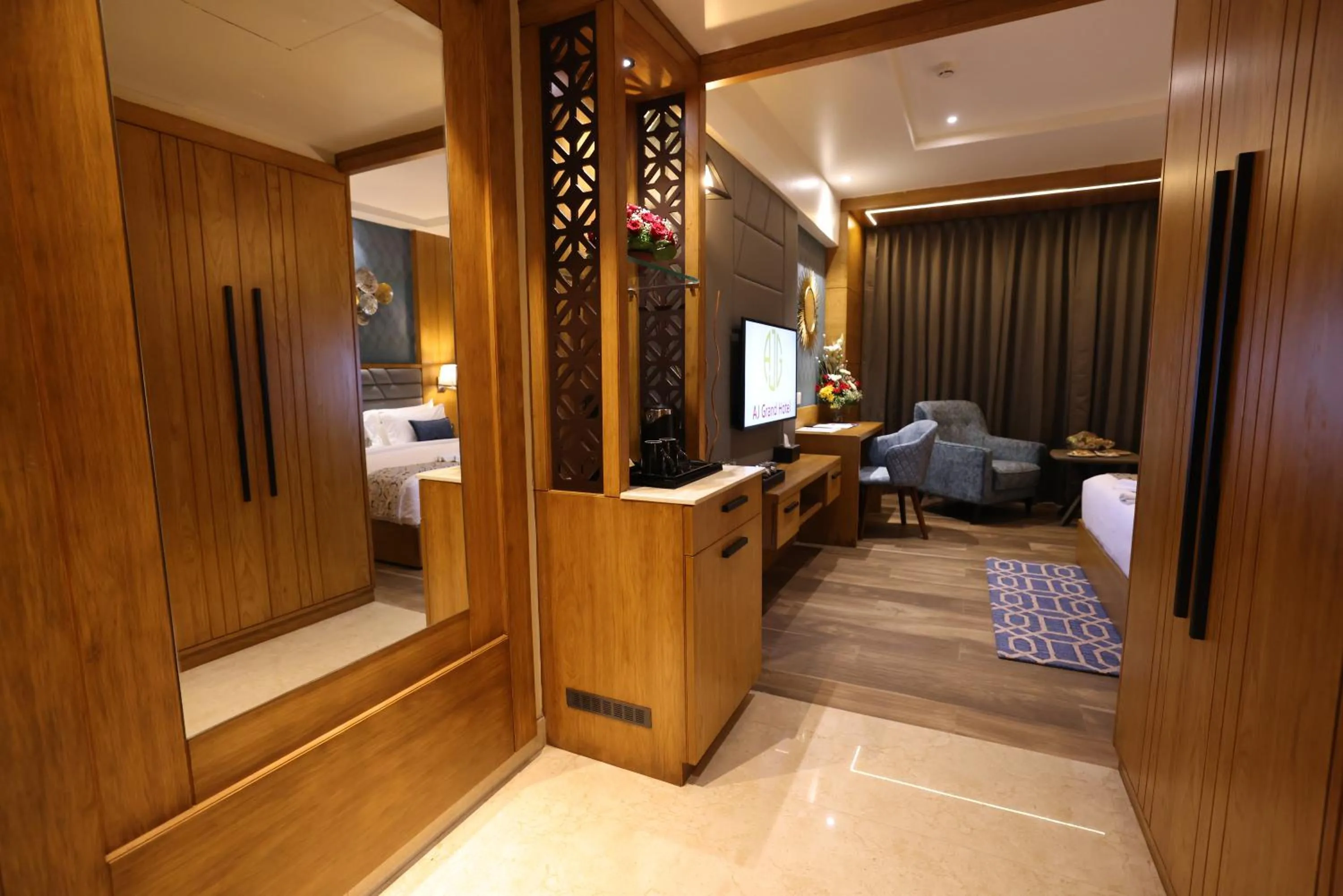 Toilet, Bed in AJ Grand Hotel