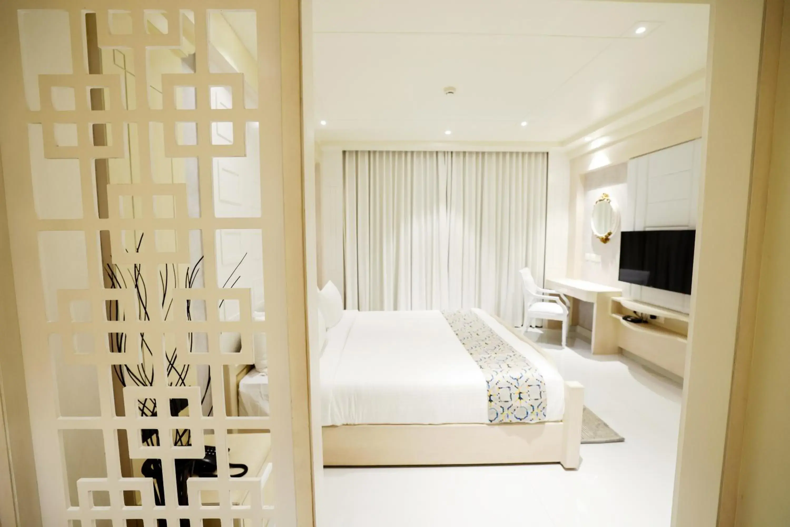 Bed in AJ Grand Hotel Bed in AJ Grand Hotel