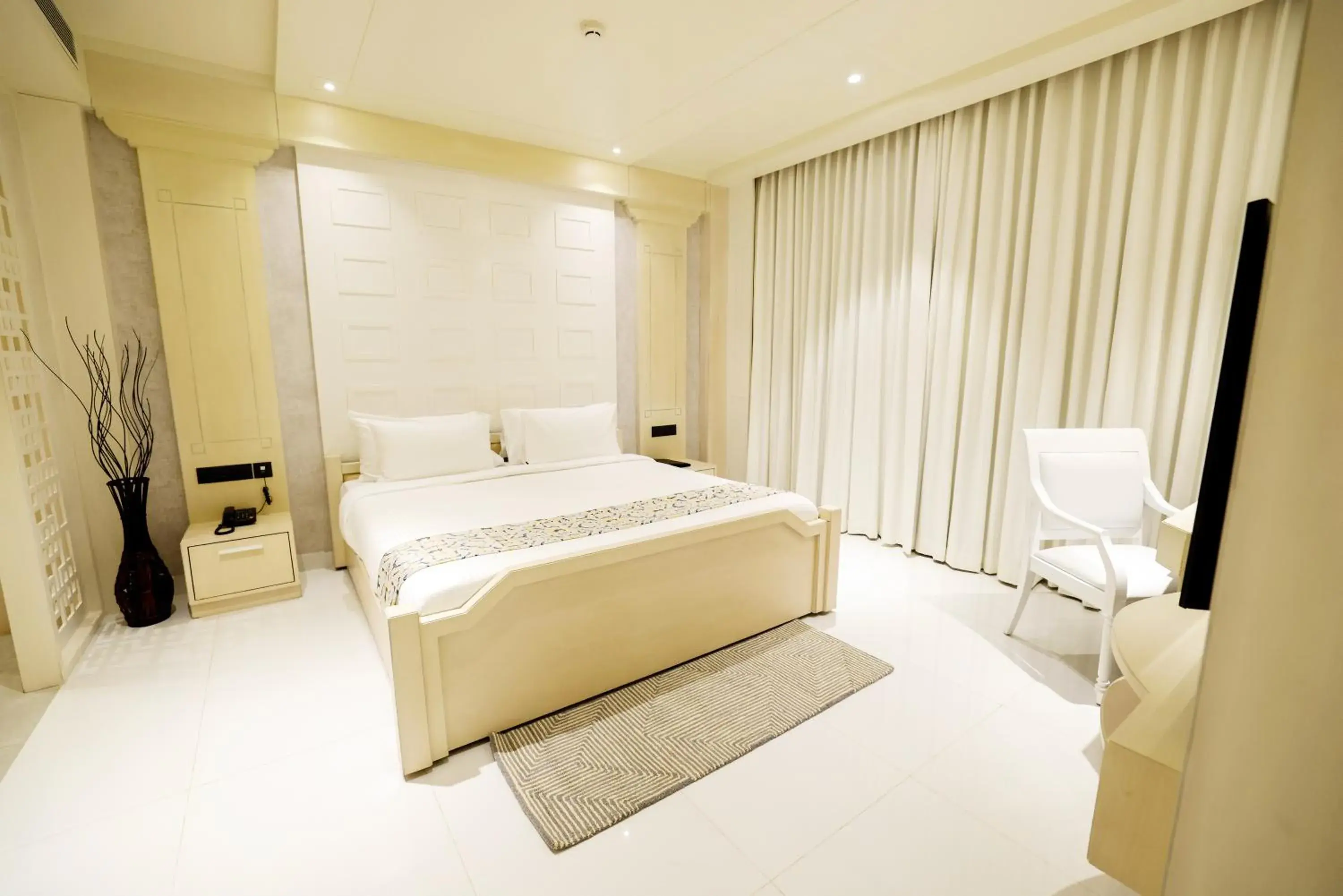 Bed in AJ Grand Hotel Bed in AJ Grand Hotel