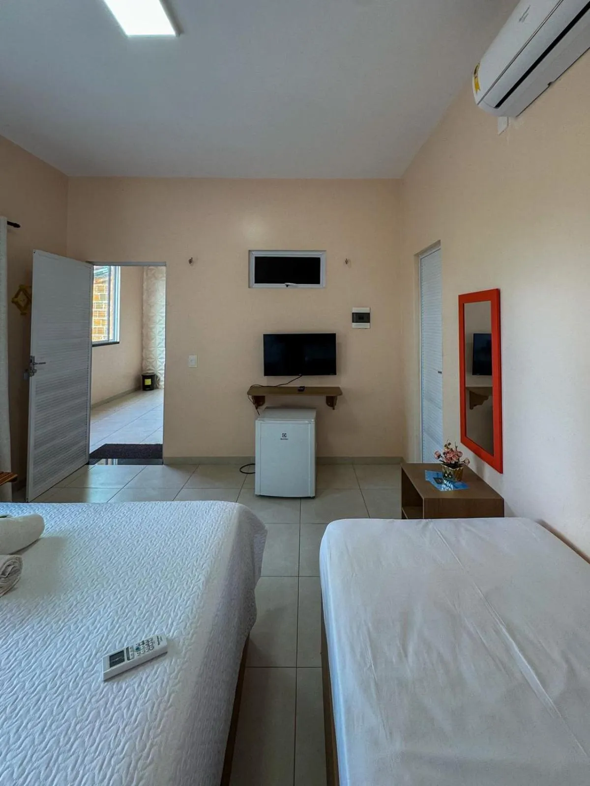 Bed in Pousada dos Corais