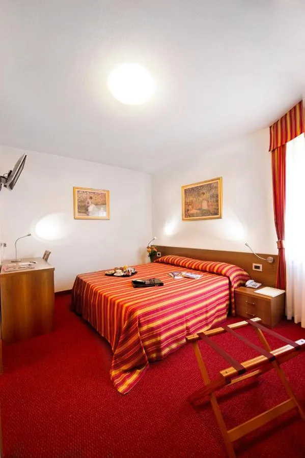 Bed in Hotel Sassella