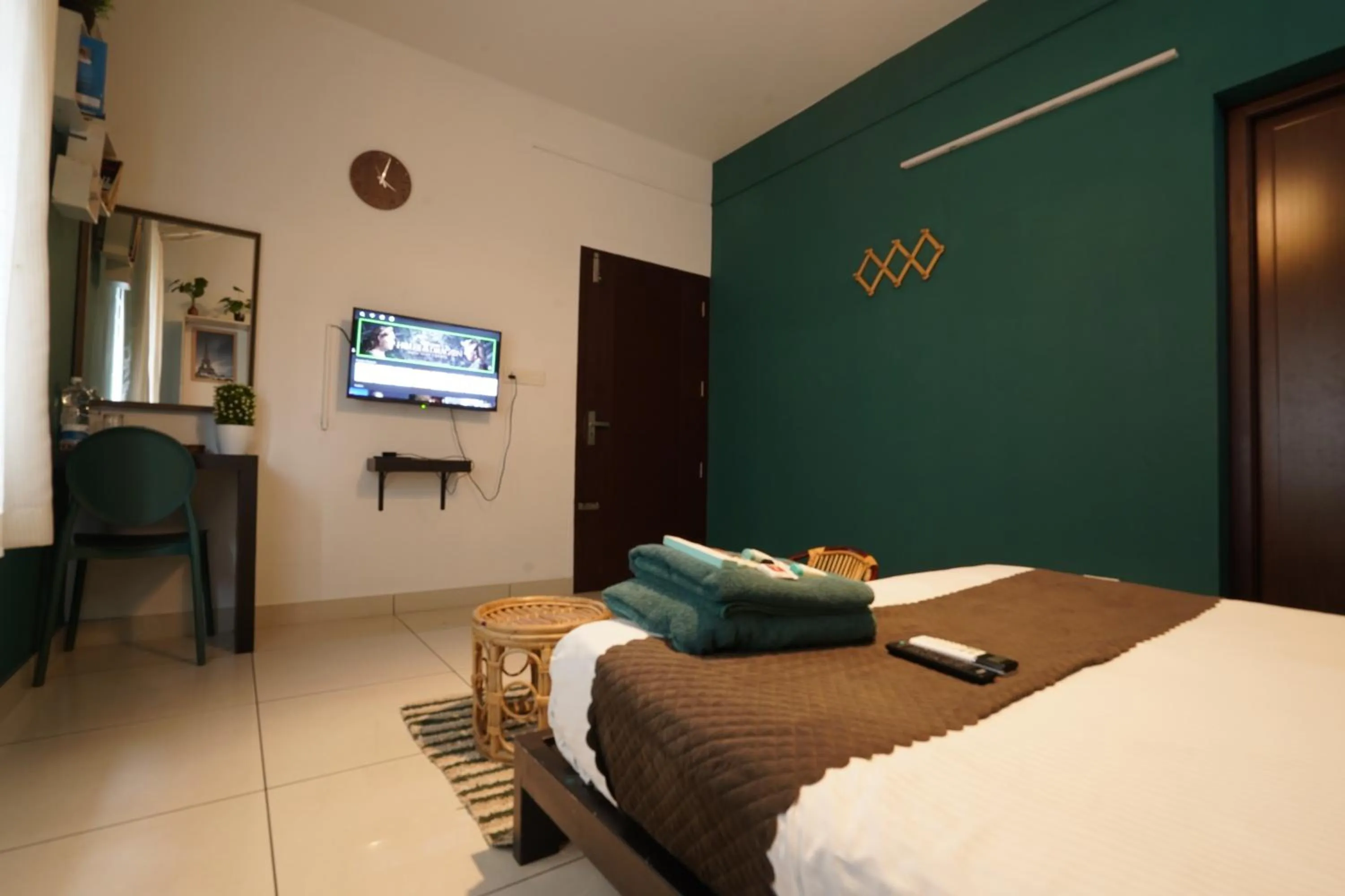 Bed in Atmos Inn Calicut Near Aster Mims Hospital