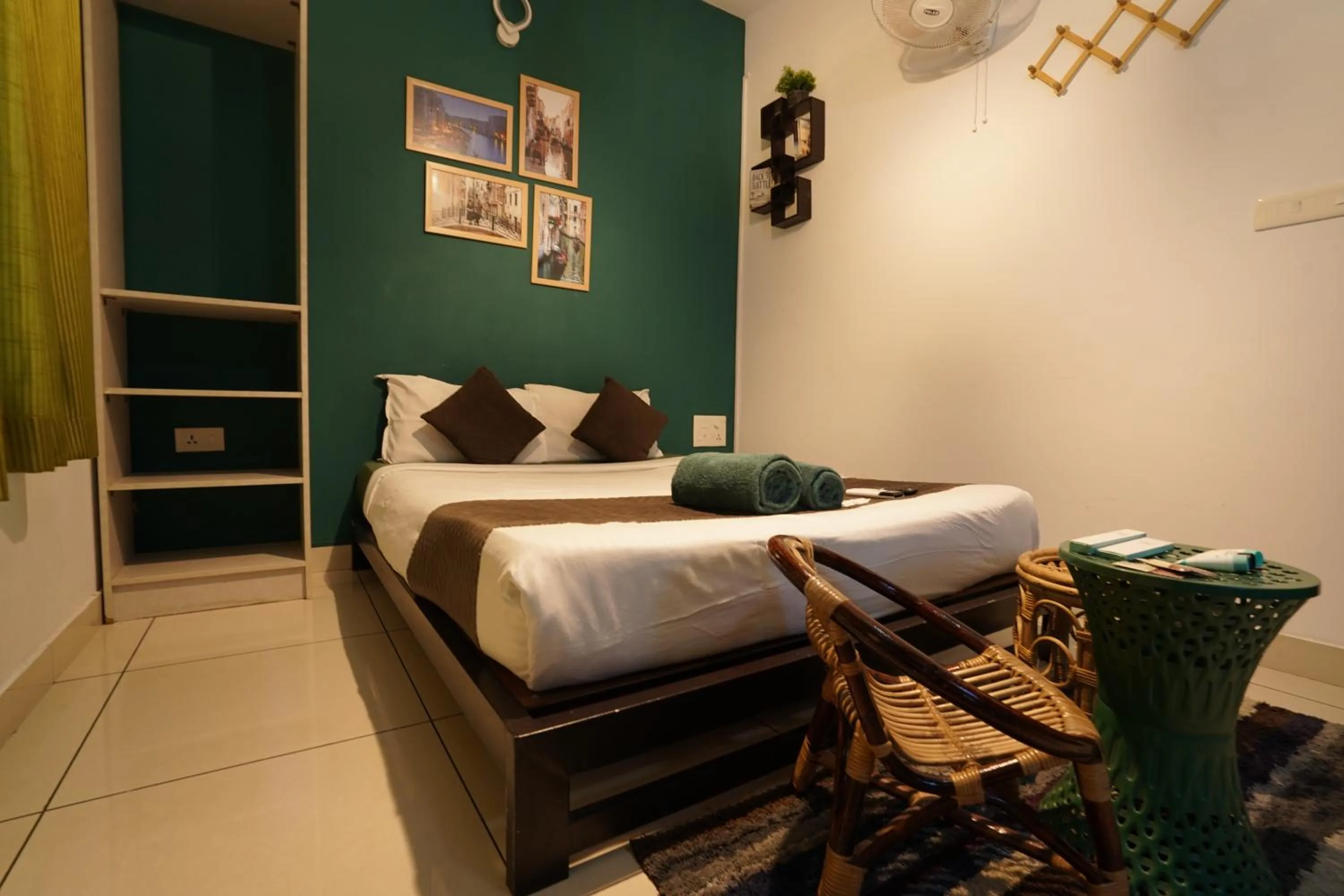 Bed in Atmos Inn Calicut Near Aster Mims Hospital