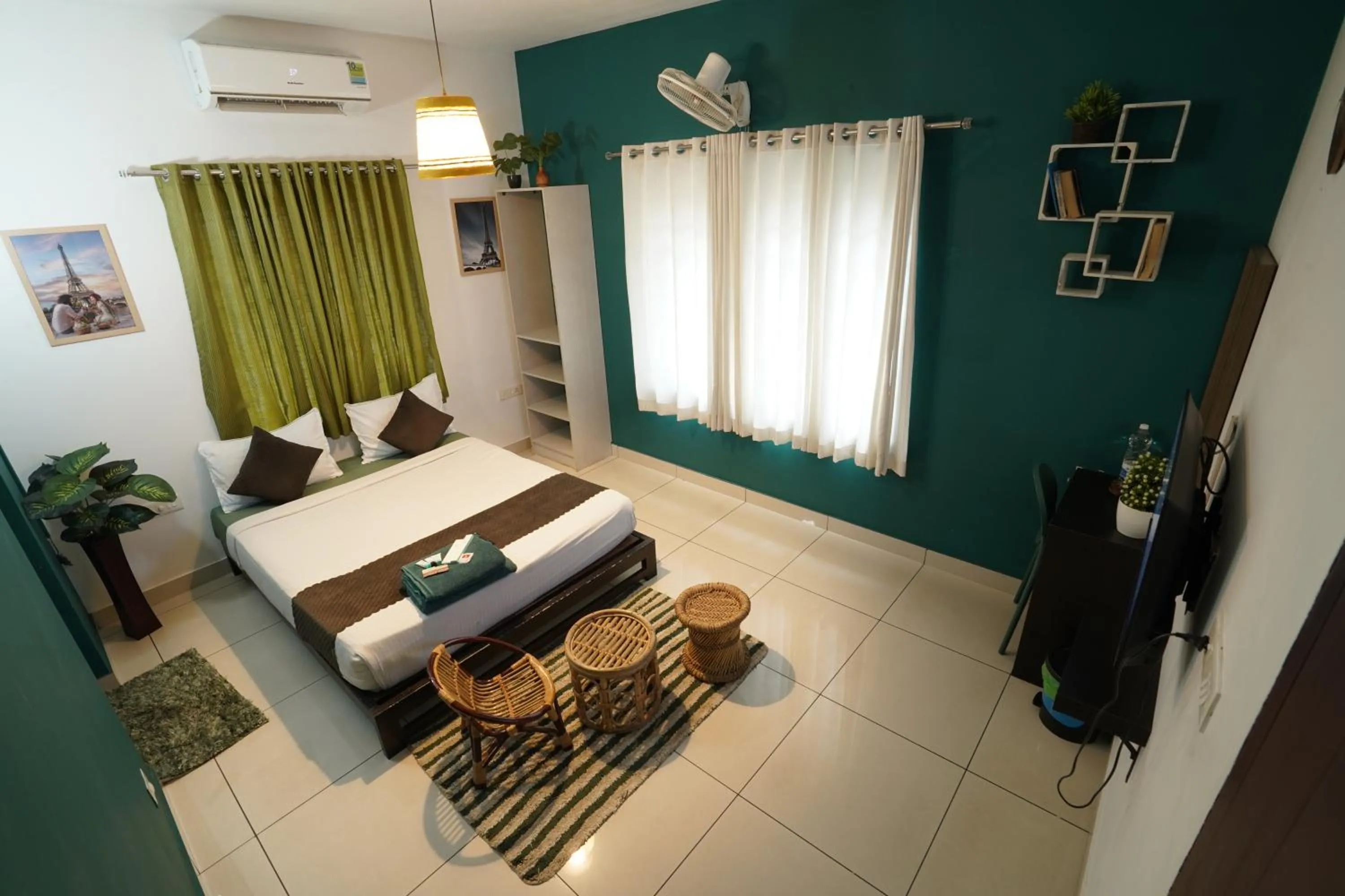 Bed in Atmos Inn Calicut Near Aster Mims Hospital