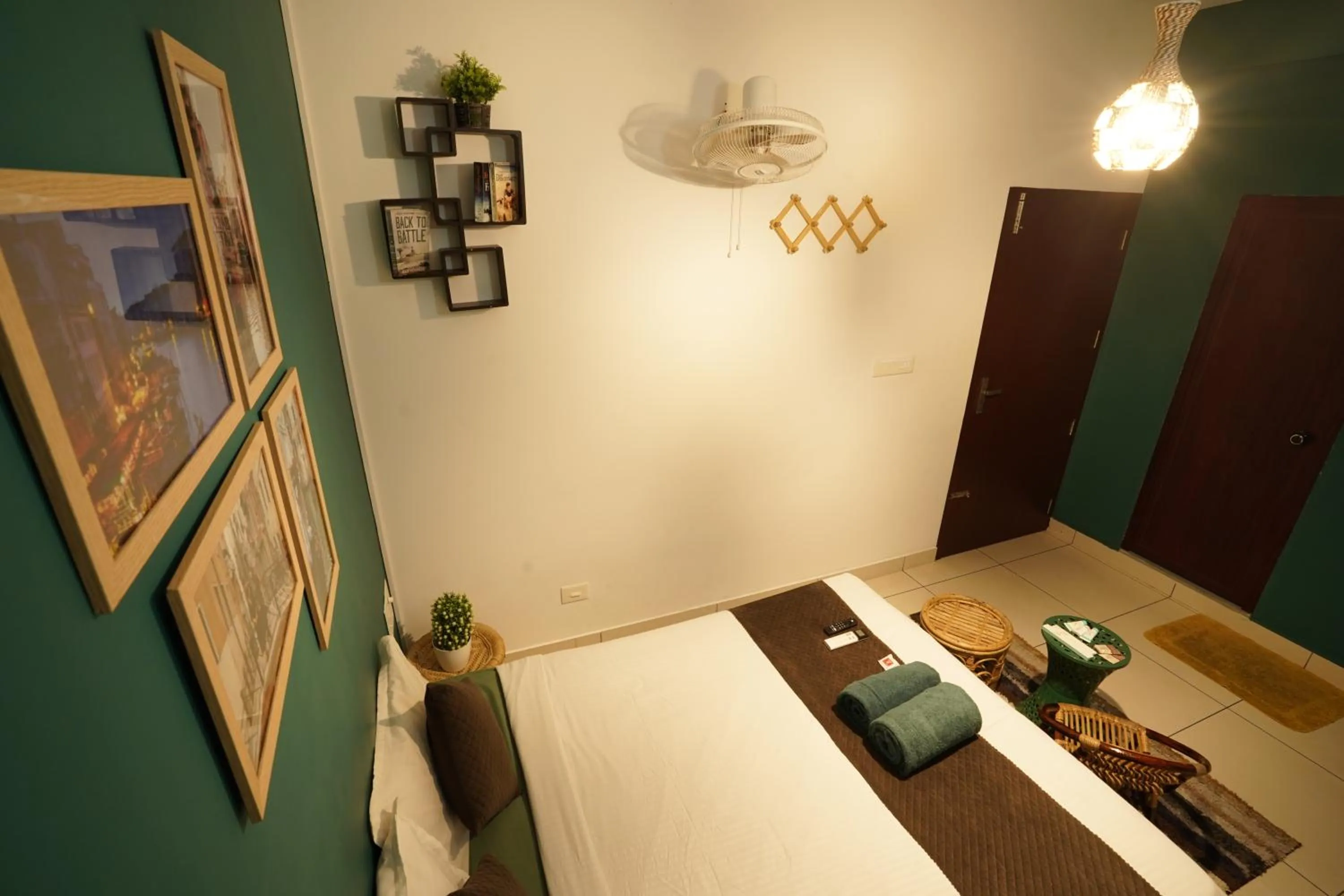 Bed in Atmos Inn Calicut Near Aster Mims Hospital