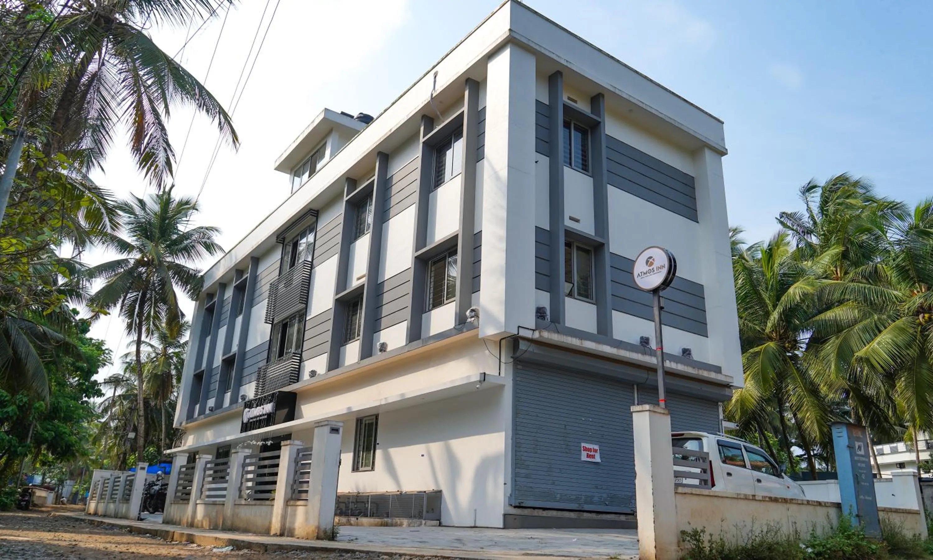 Property building in Atmos Inn Calicut Near Aster Mims Hospital