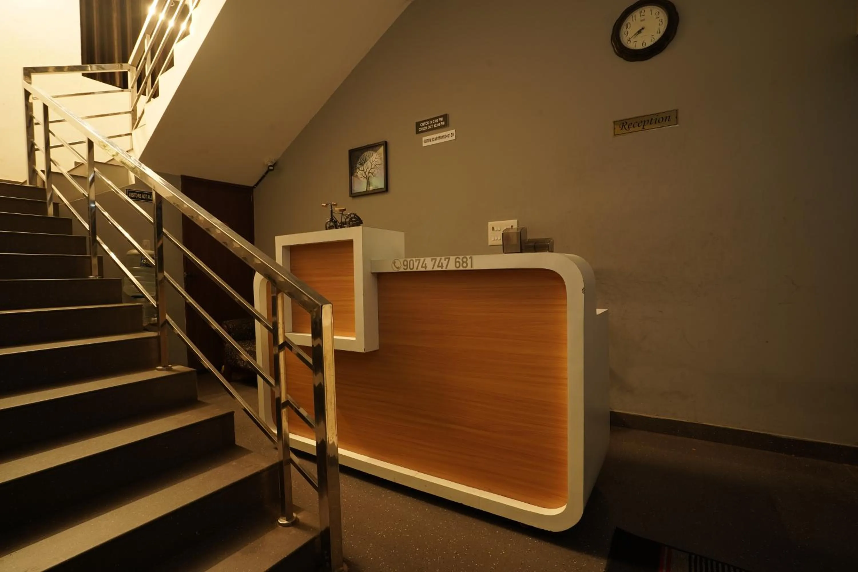 Lobby or reception in Atmos Inn Calicut Near Aster Mims Hospital