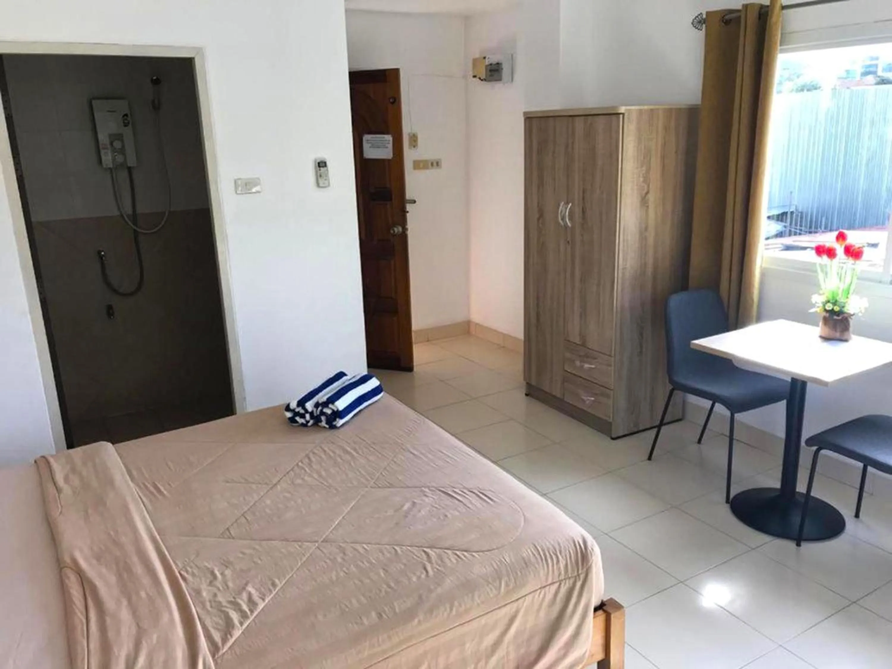 Bed in K2 Seaside Suites