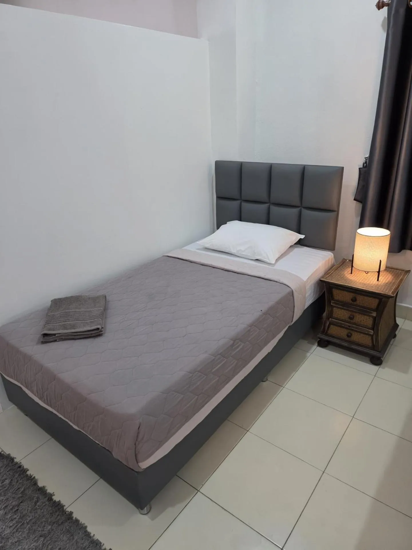 Bed in K2 Seaside Suites