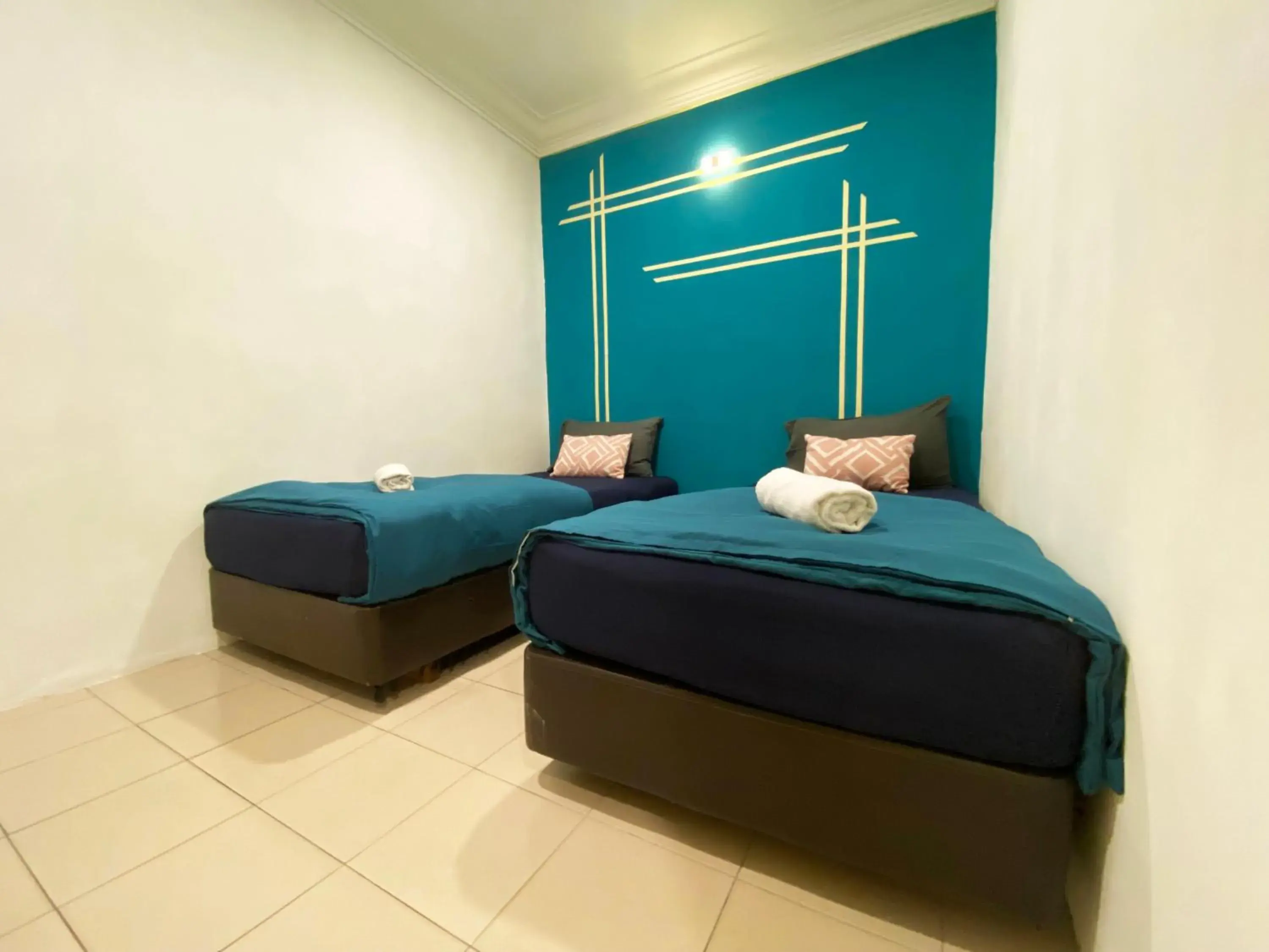 Bed in Hotel 91 Taman Daya Bed in Hotel 91 Taman Daya