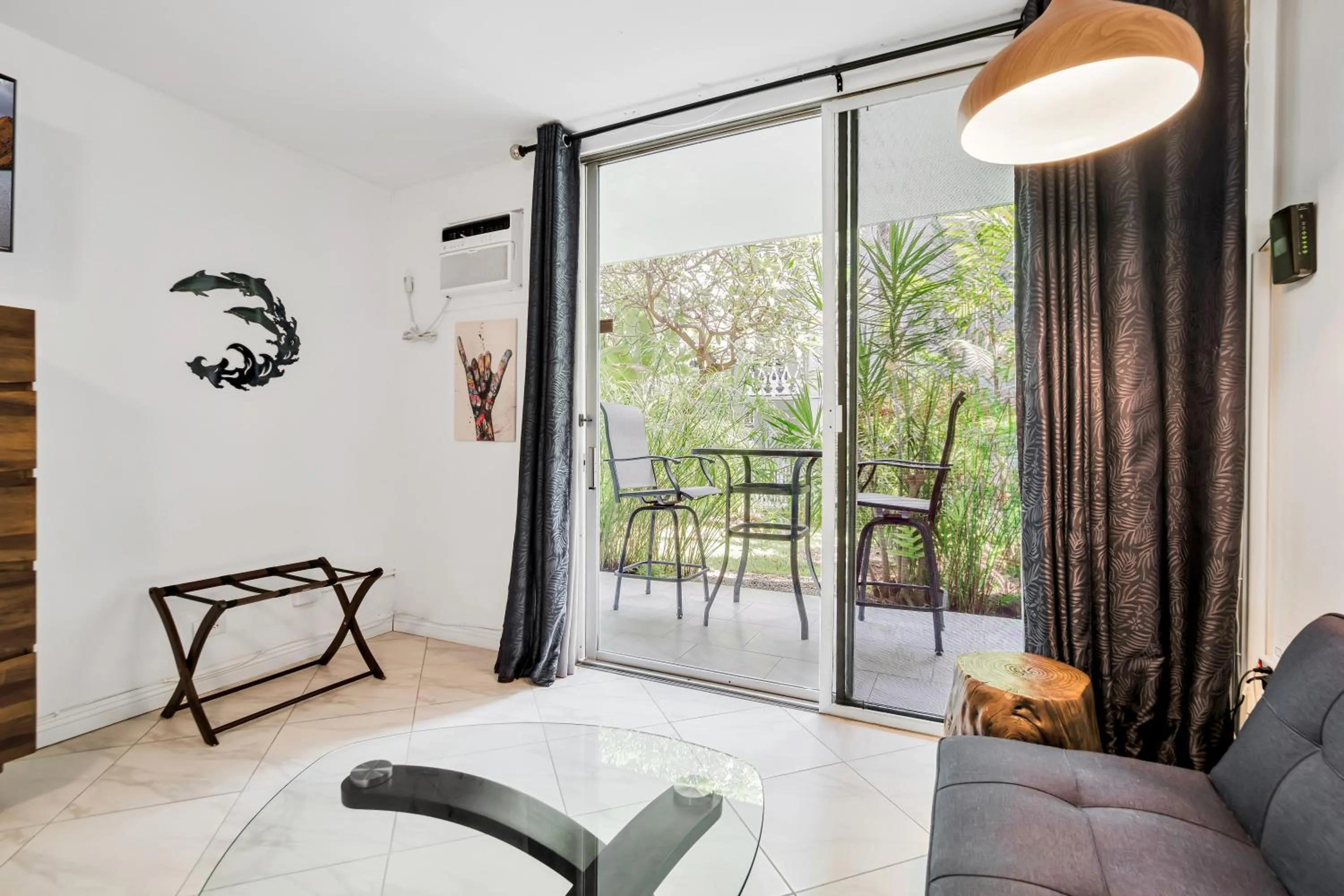 Patio in DOWNTOWN Hawaiian Theme Condo with Hot Tub, Pool & Beach - Kona Islander Inn