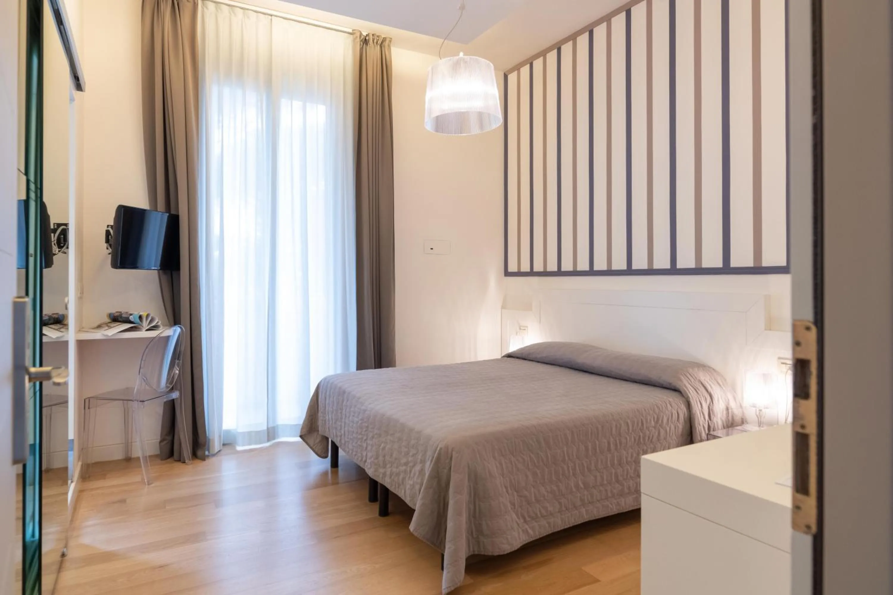 Photo of the whole room, Bed in Perla Verde Hotel