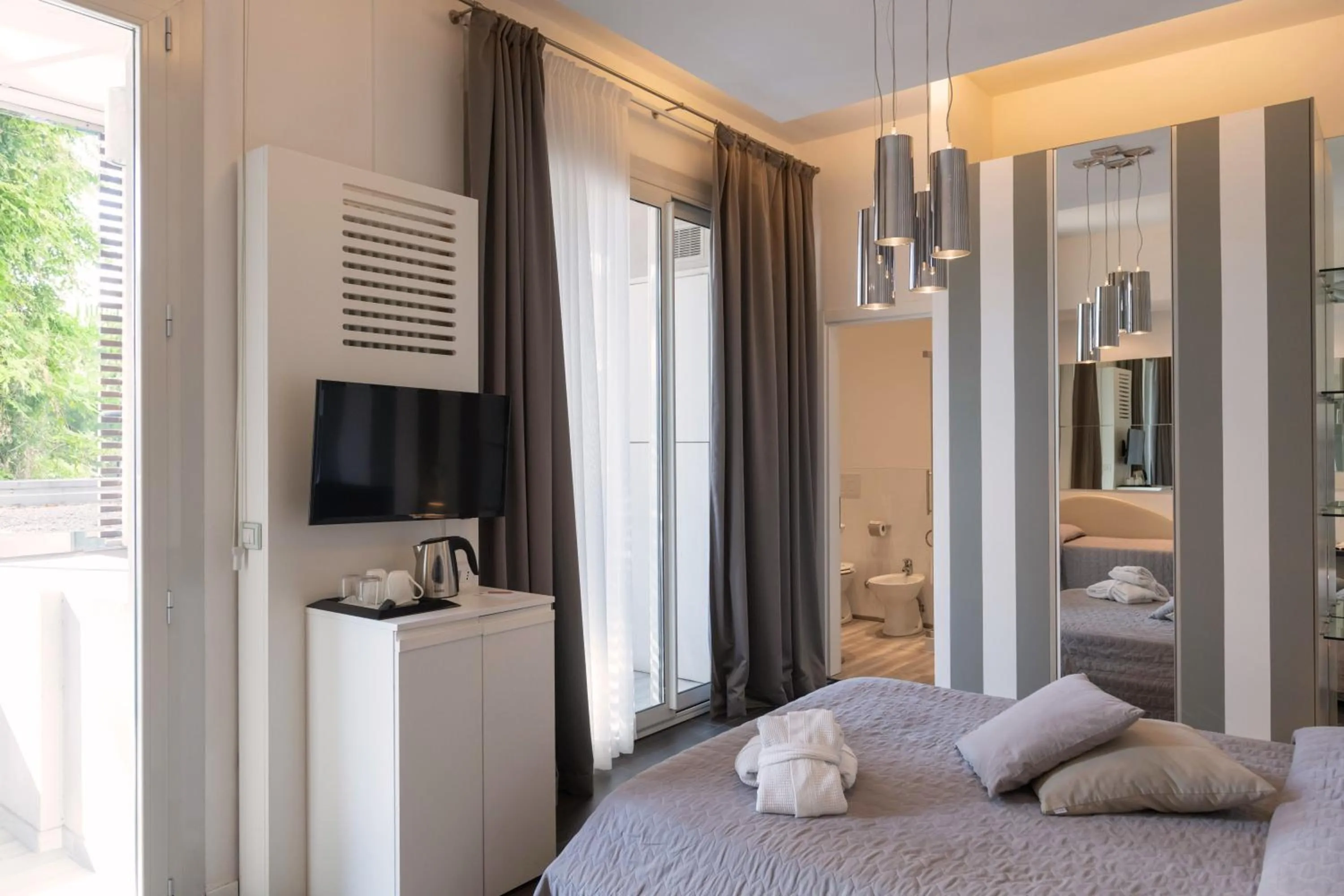 Bedroom, Bed in Perla Verde Hotel