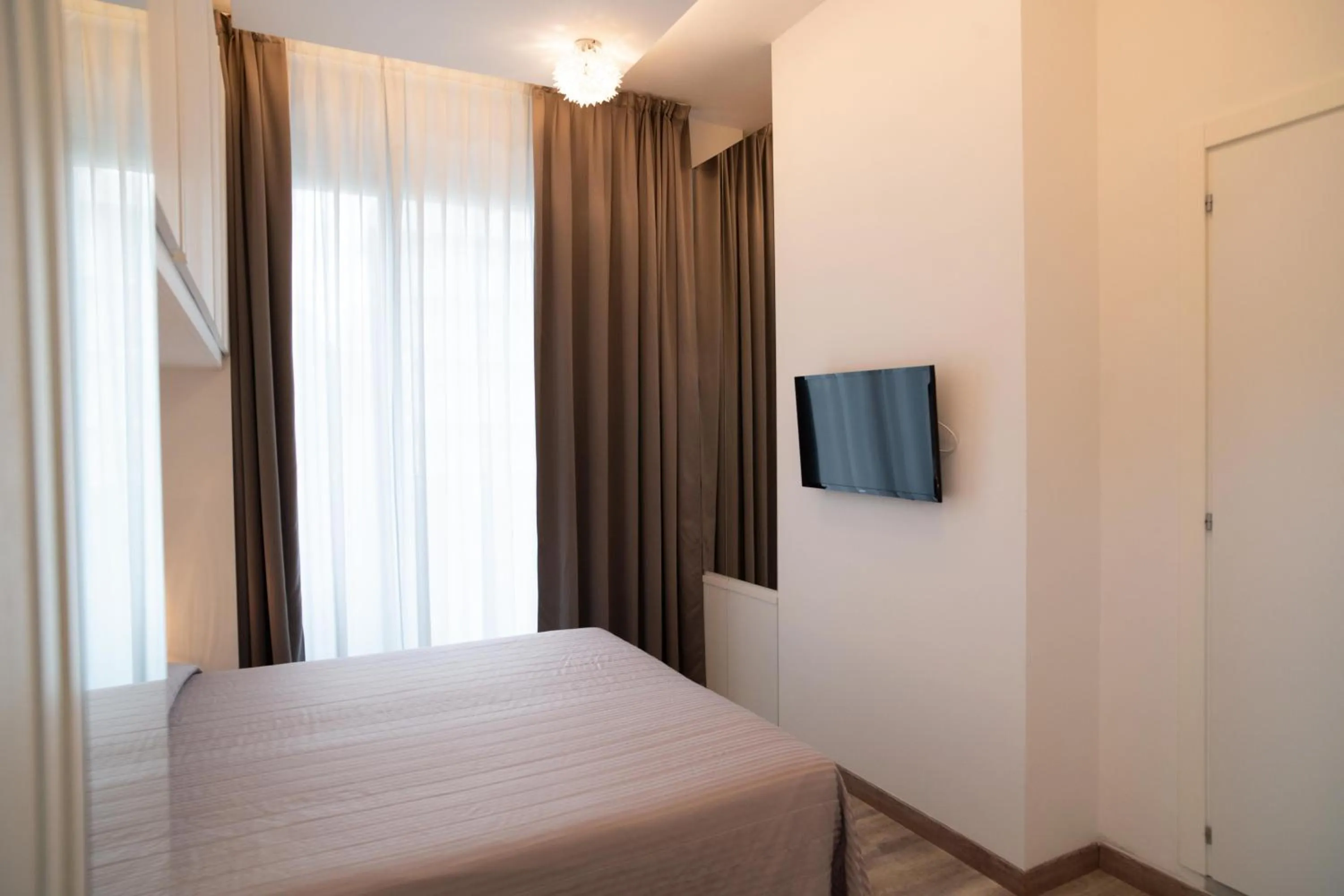 Photo of the whole room, Bed in Perla Verde Hotel