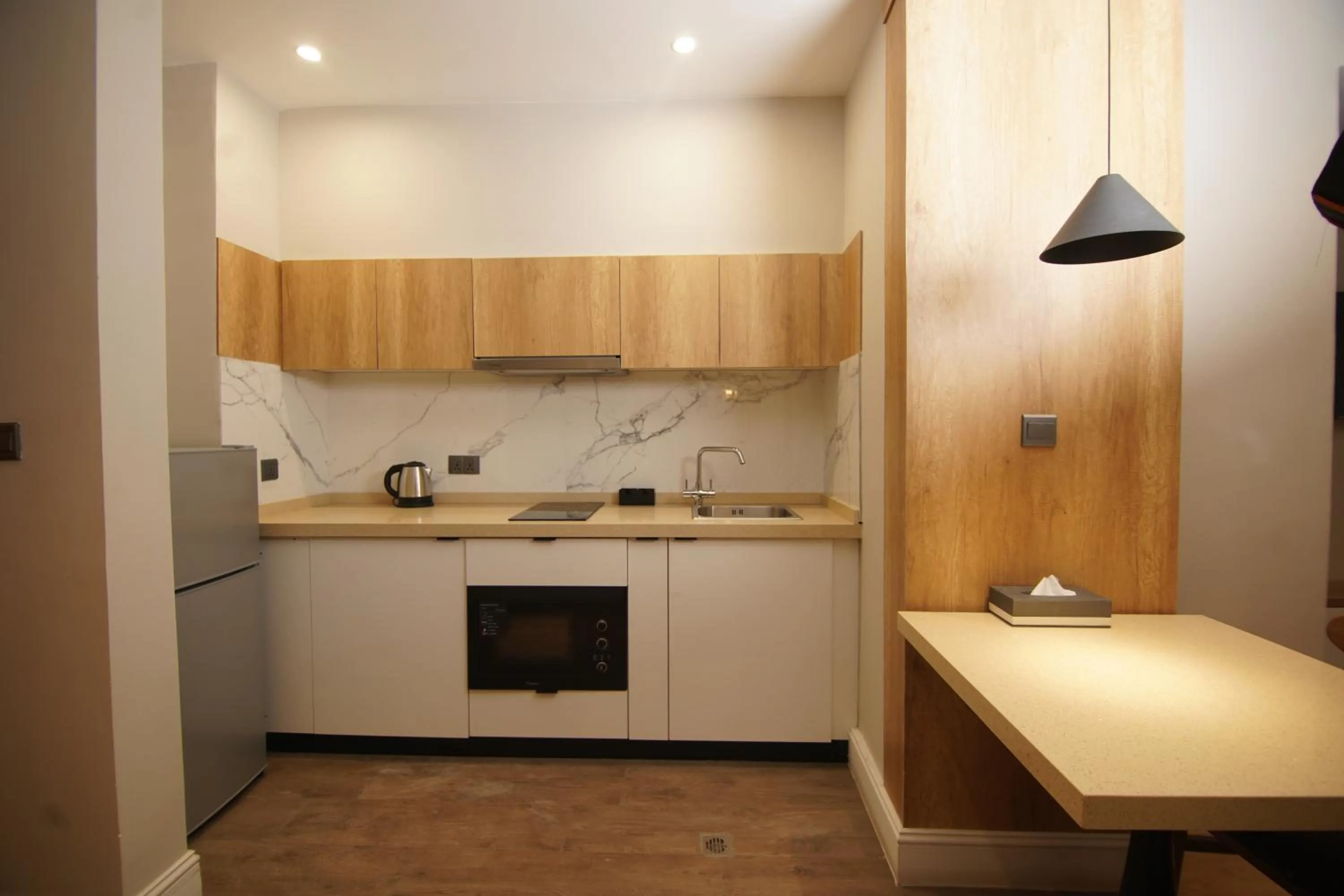 Kitchen or kitchenette in Loft Hotel Apartment