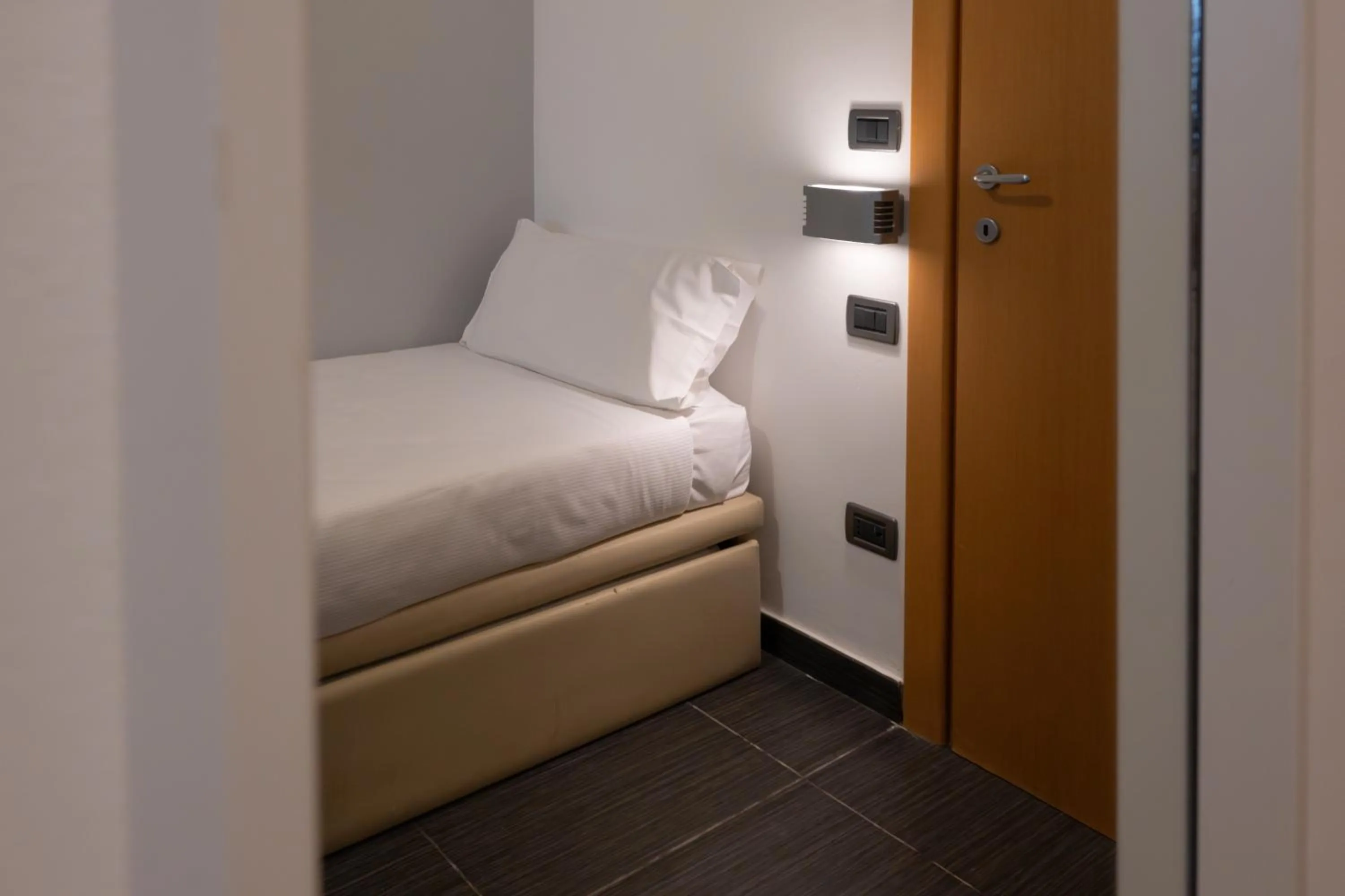 Bed in Hotel Riva Del Sole