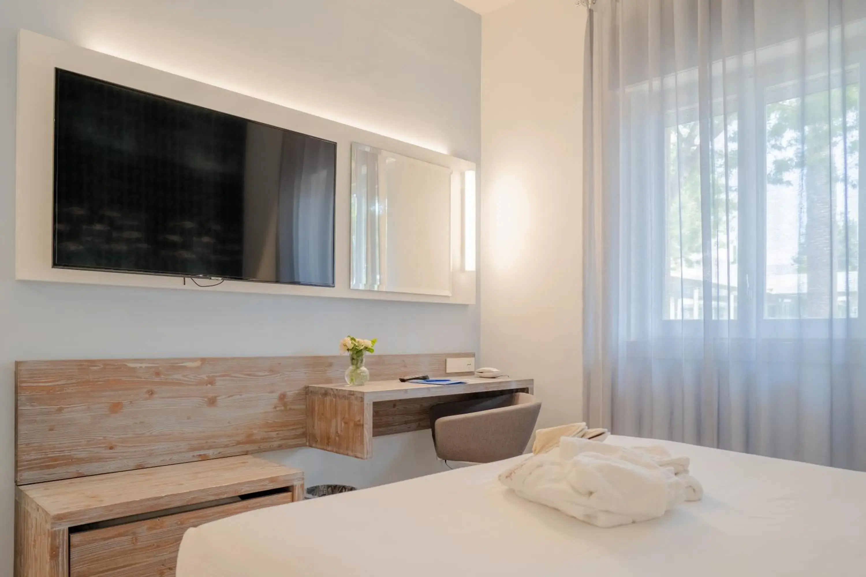 Bed in Hotel Riva Del Sole Bed in Hotel Riva Del Sole