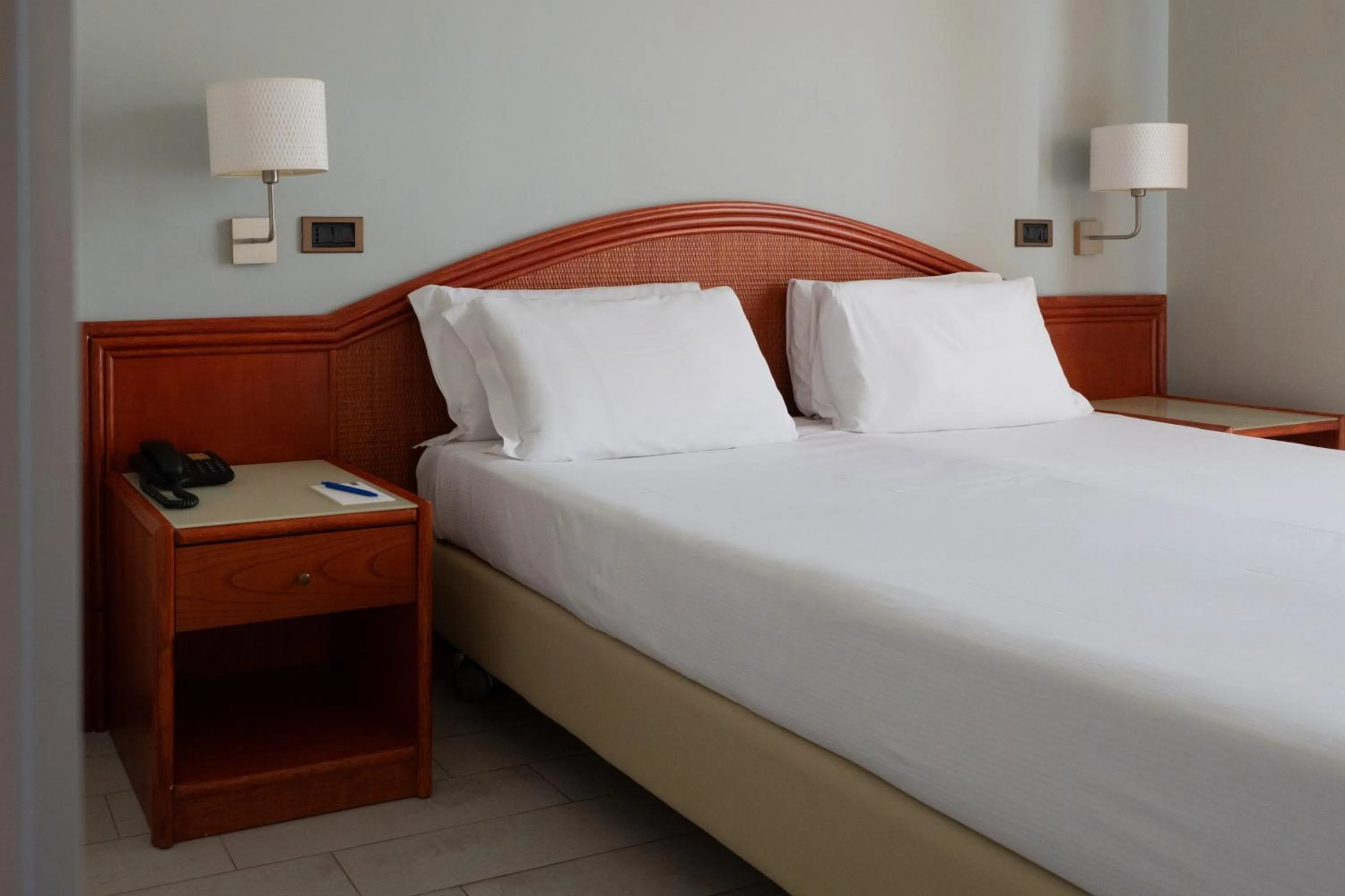 Bed in Hotel Riva Del Sole