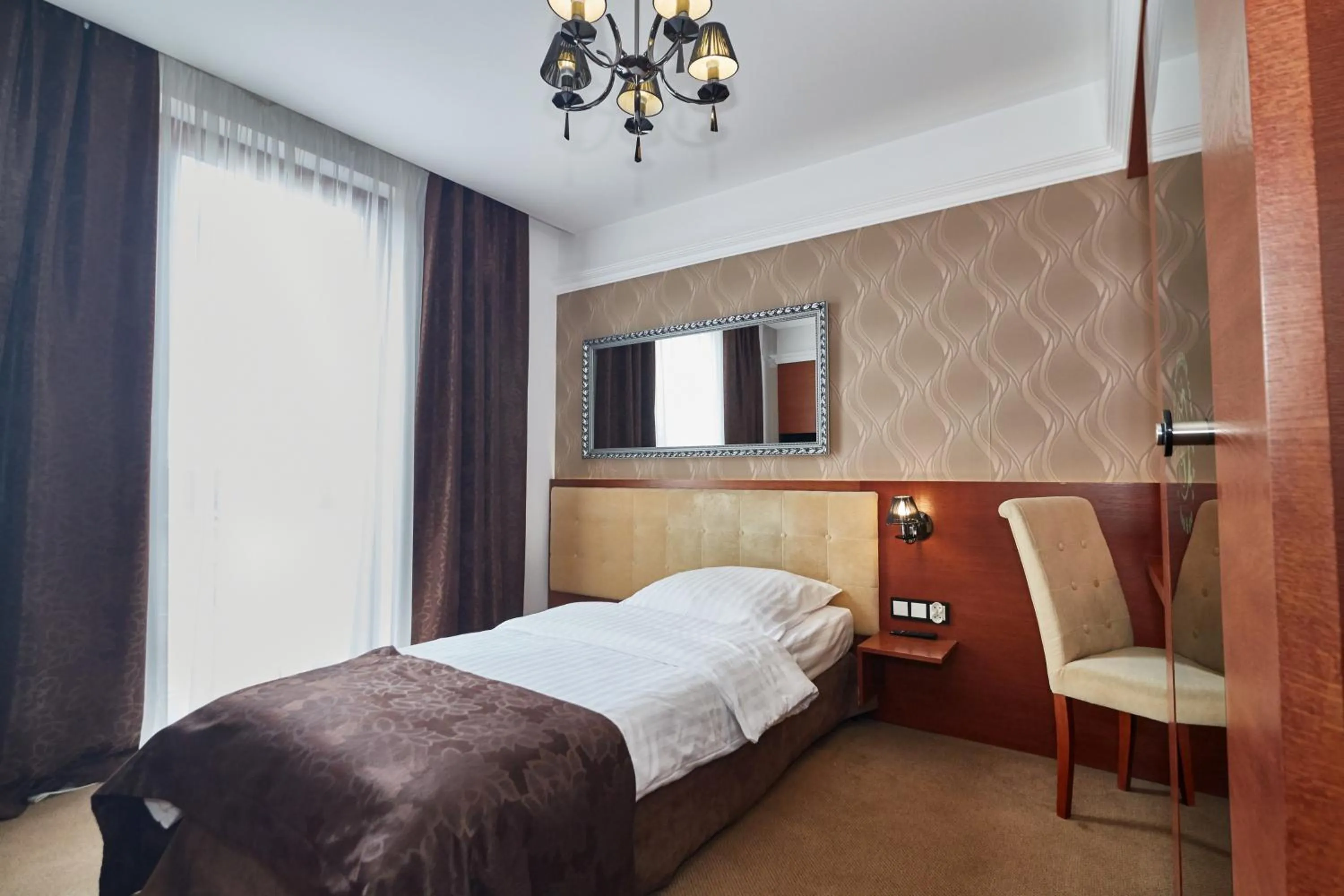 Bed in Hotel&Spa Kameleon