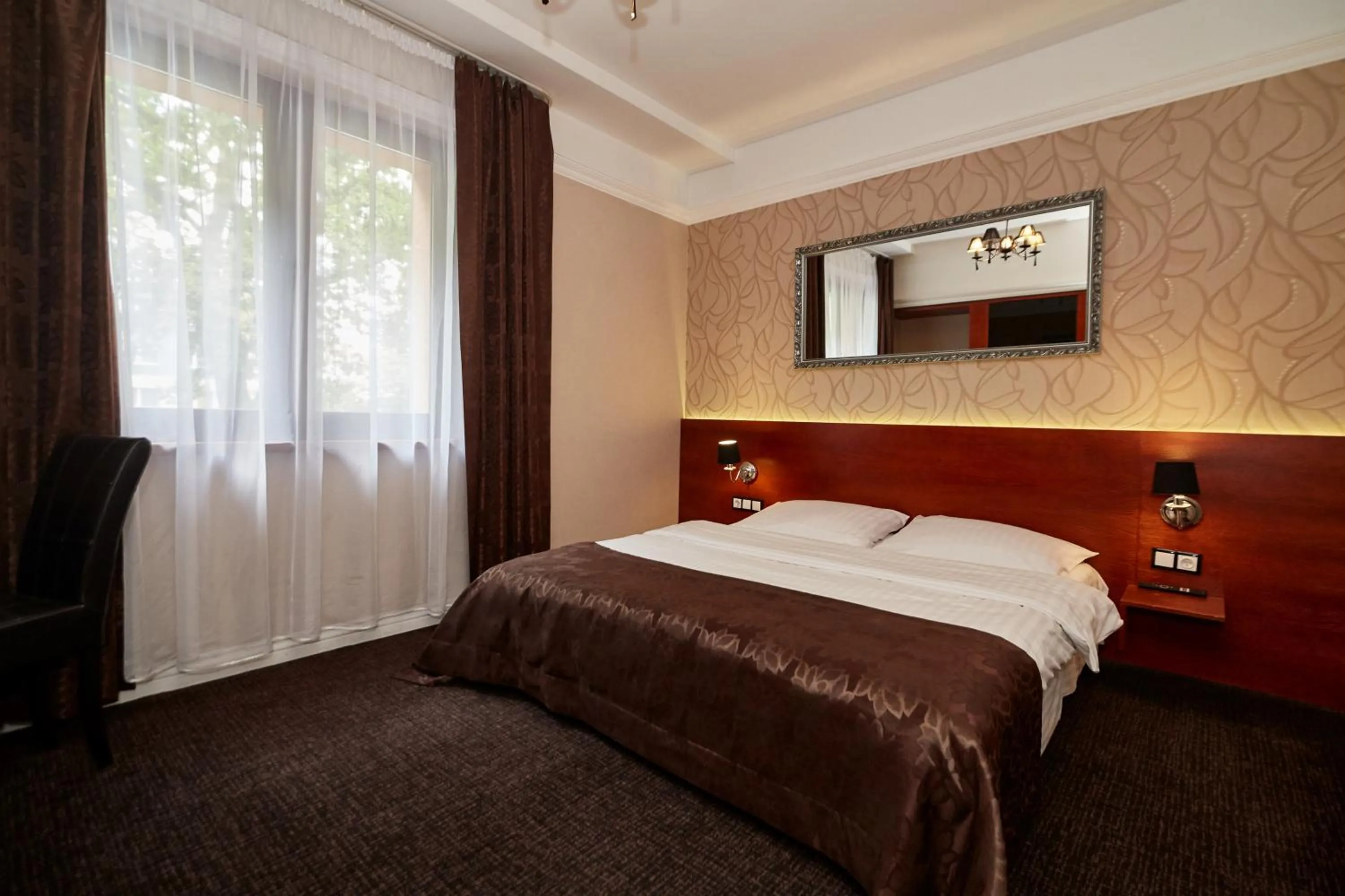 Bed in Hotel&Spa Kameleon