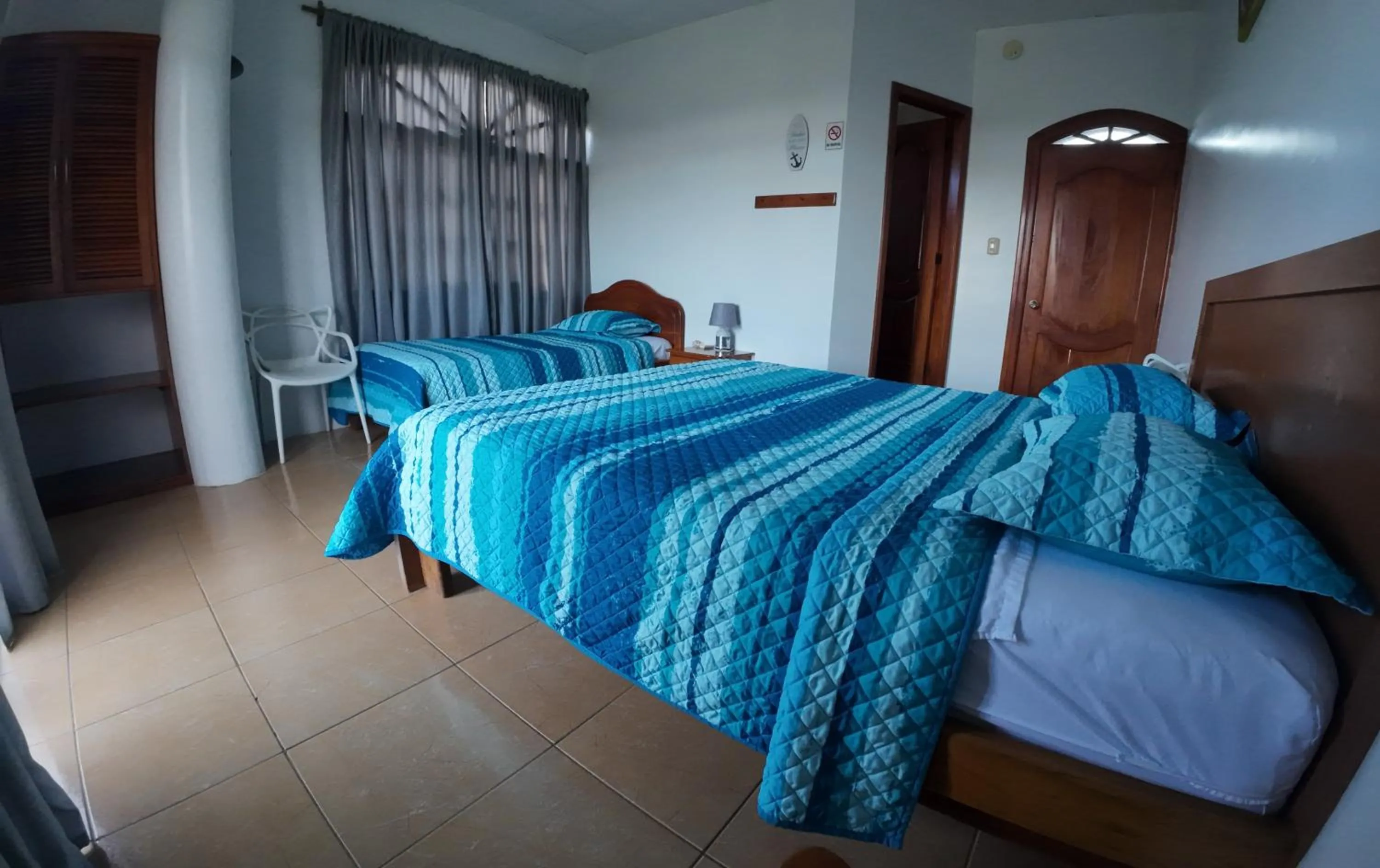 Bed in Hostal Neptuno - Poseidon