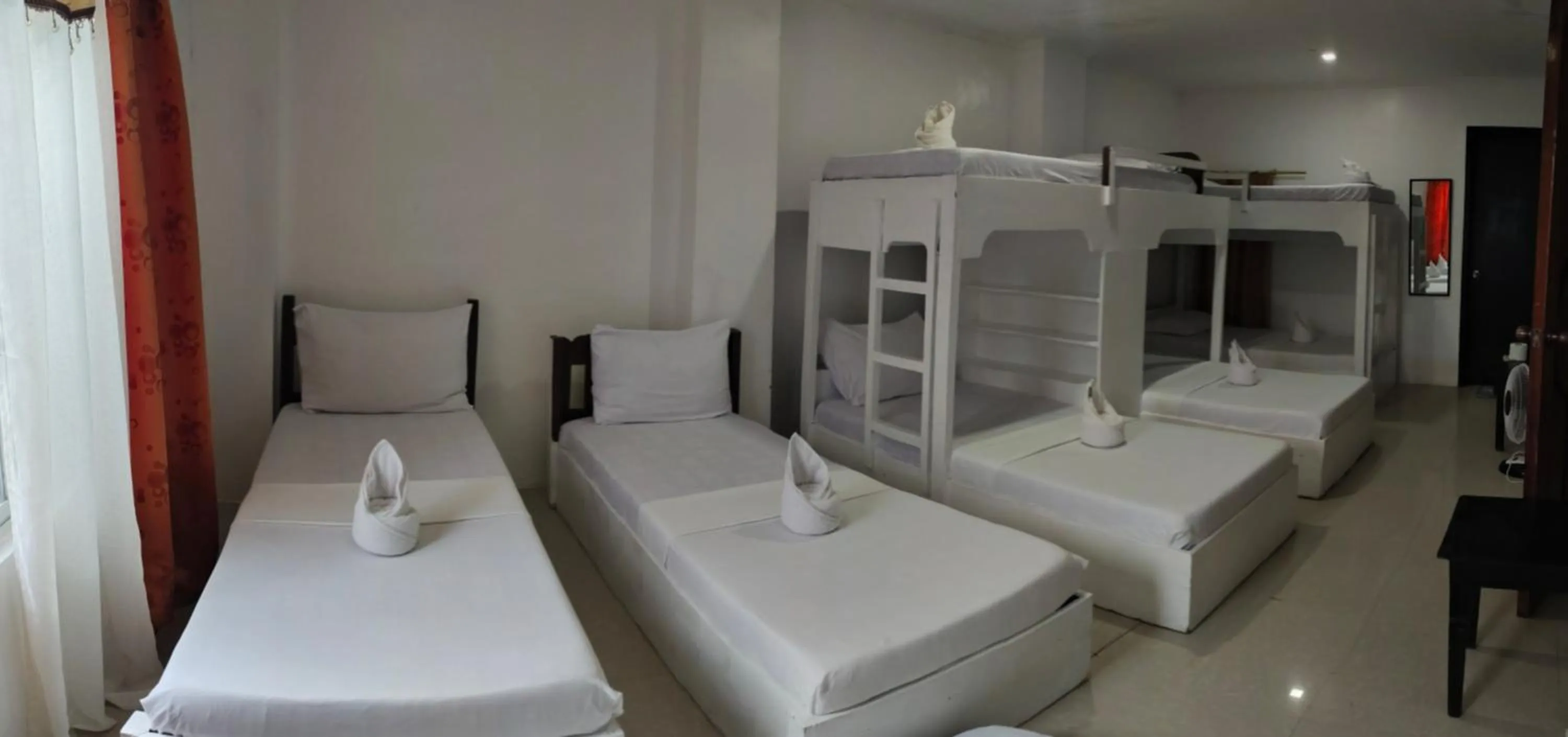 Bed in Island Hop Inn