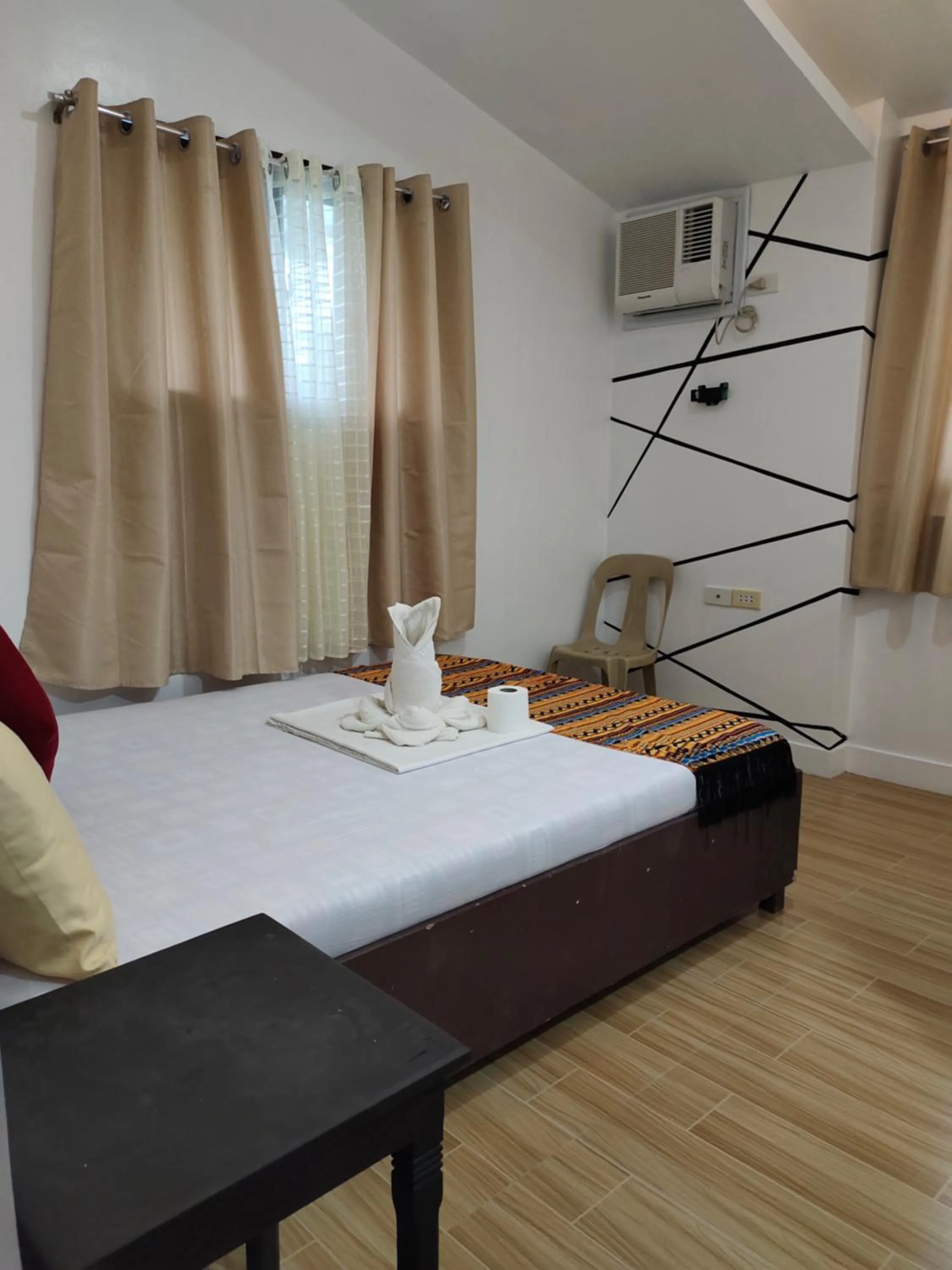 Bed in Island Hop Inn