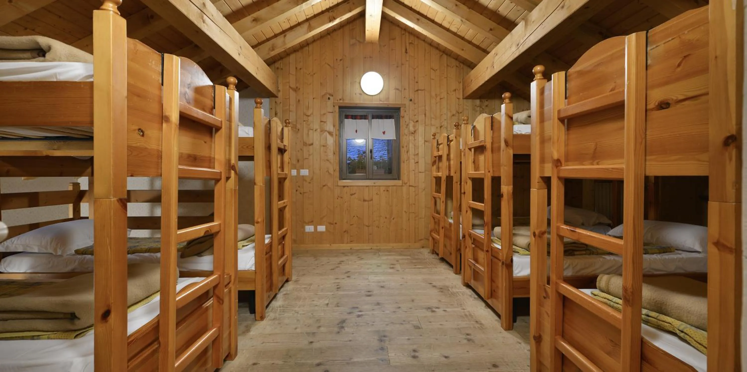 Bed in Albergo Casa Alpina San Luigi