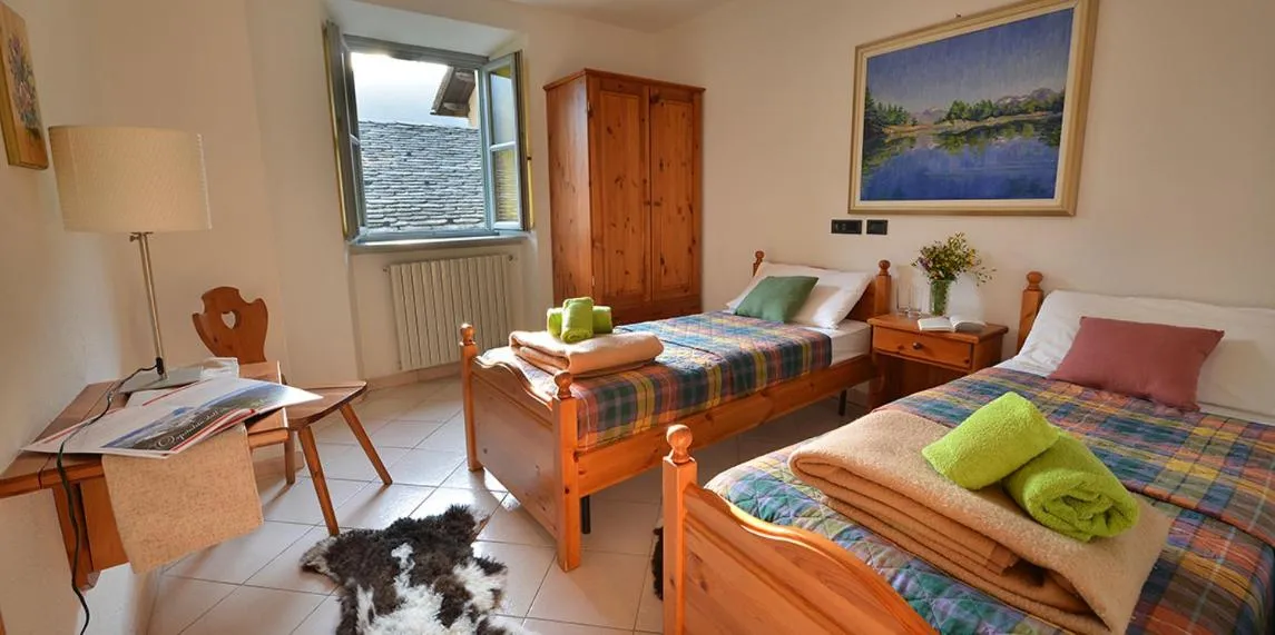 Bed in Albergo Casa Alpina San Luigi