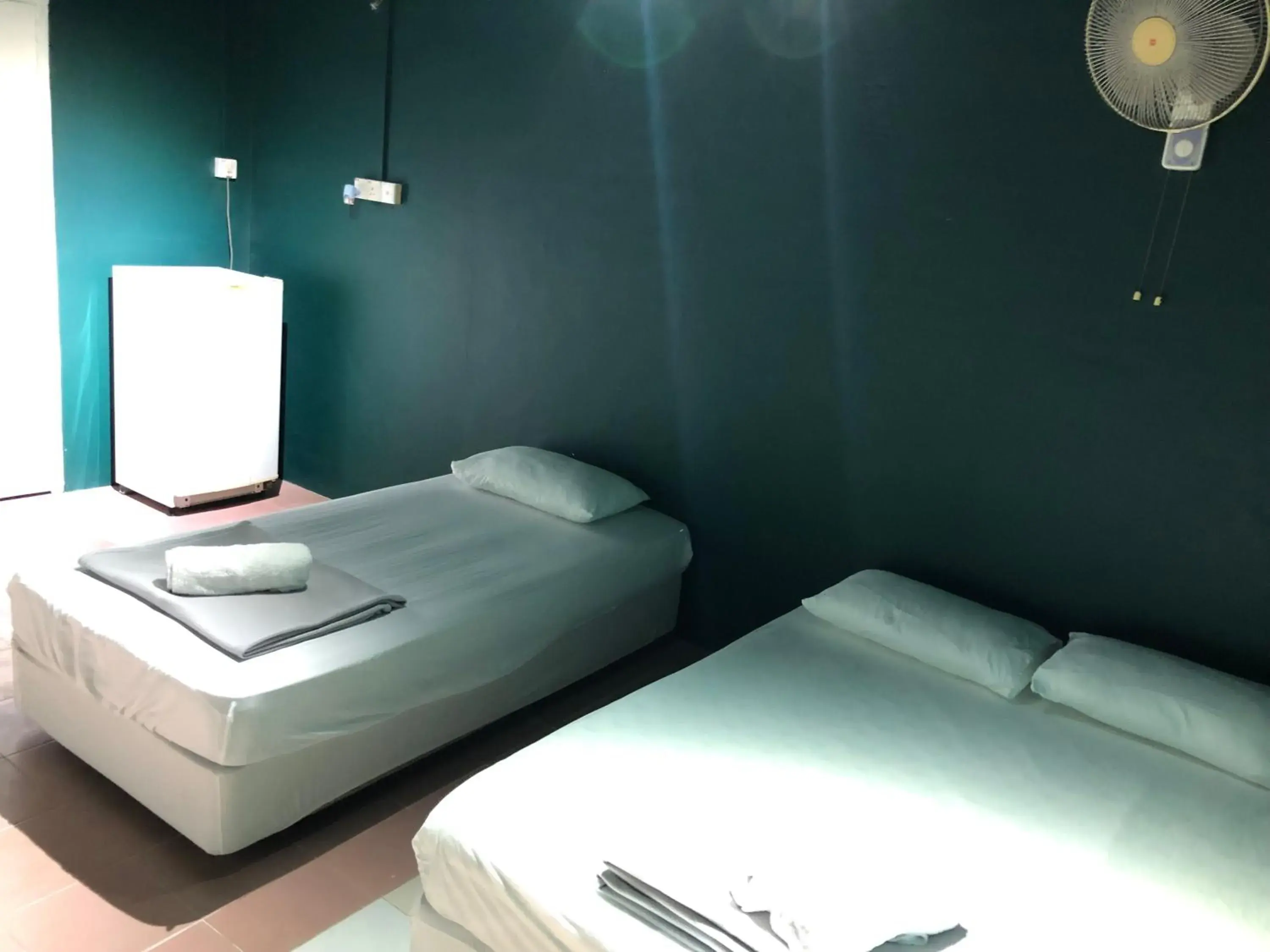 Triple Room with Private Bathroom in Rumah Tepi Istana Triple Room with Private Bathroom in Rumah Tepi Istana