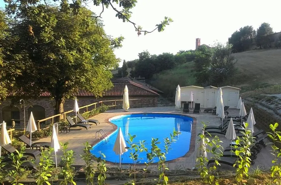 Swimming pool in Relais Sant'Uffizio Wellness & Spa