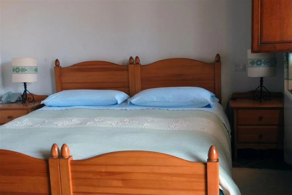 Bed in Hotel Su Nuraxi