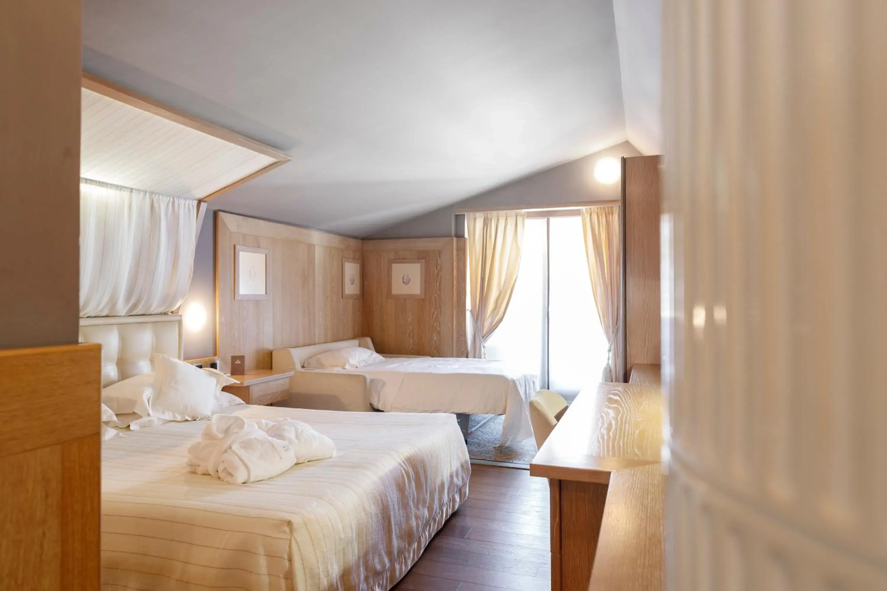 Deluxe Triple Room in Hotel Spinale Deluxe Triple Room in Hotel Spinale