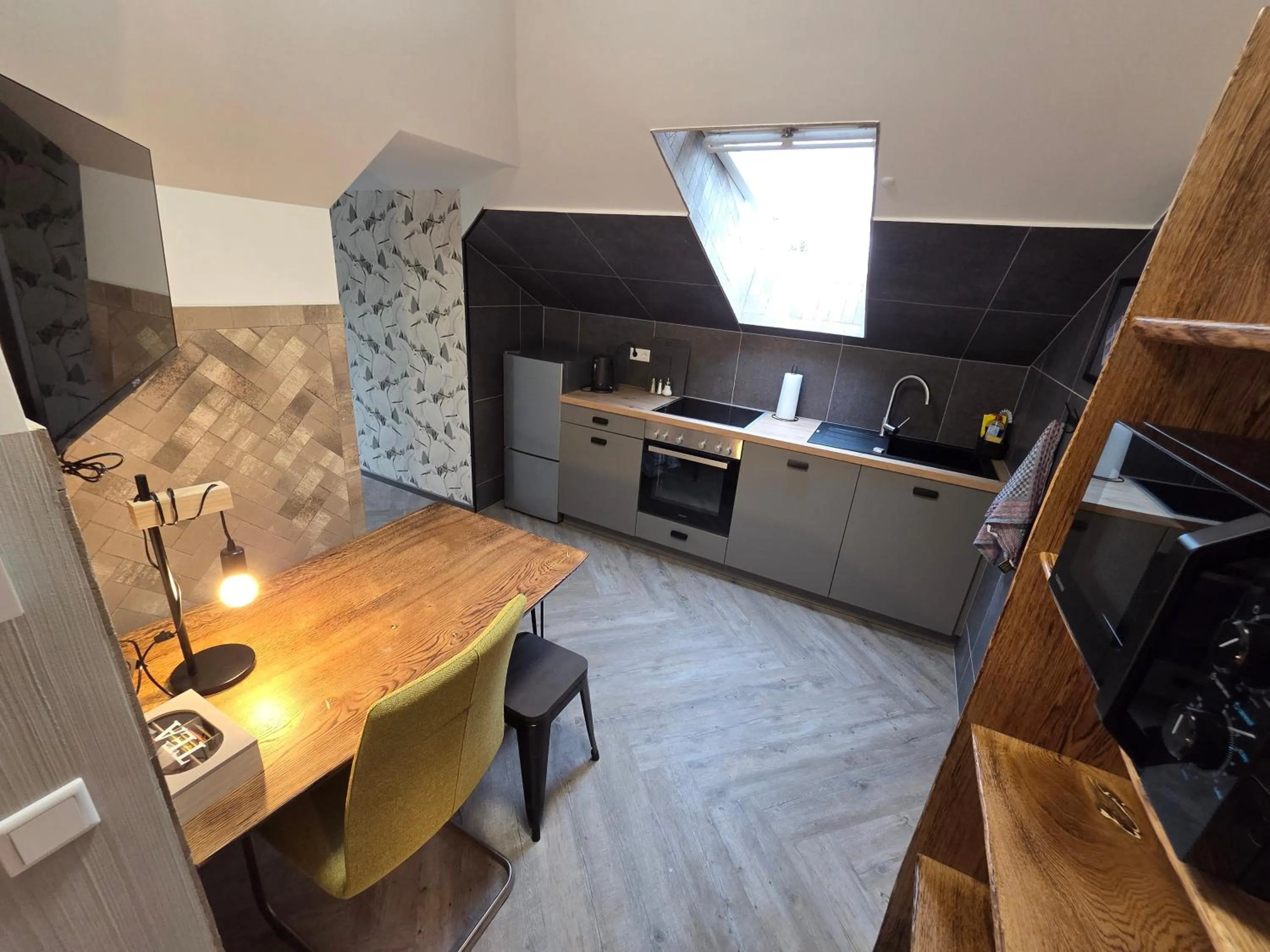 Kitchen or kitchenette in Aparthotel Fairschlafen Minden