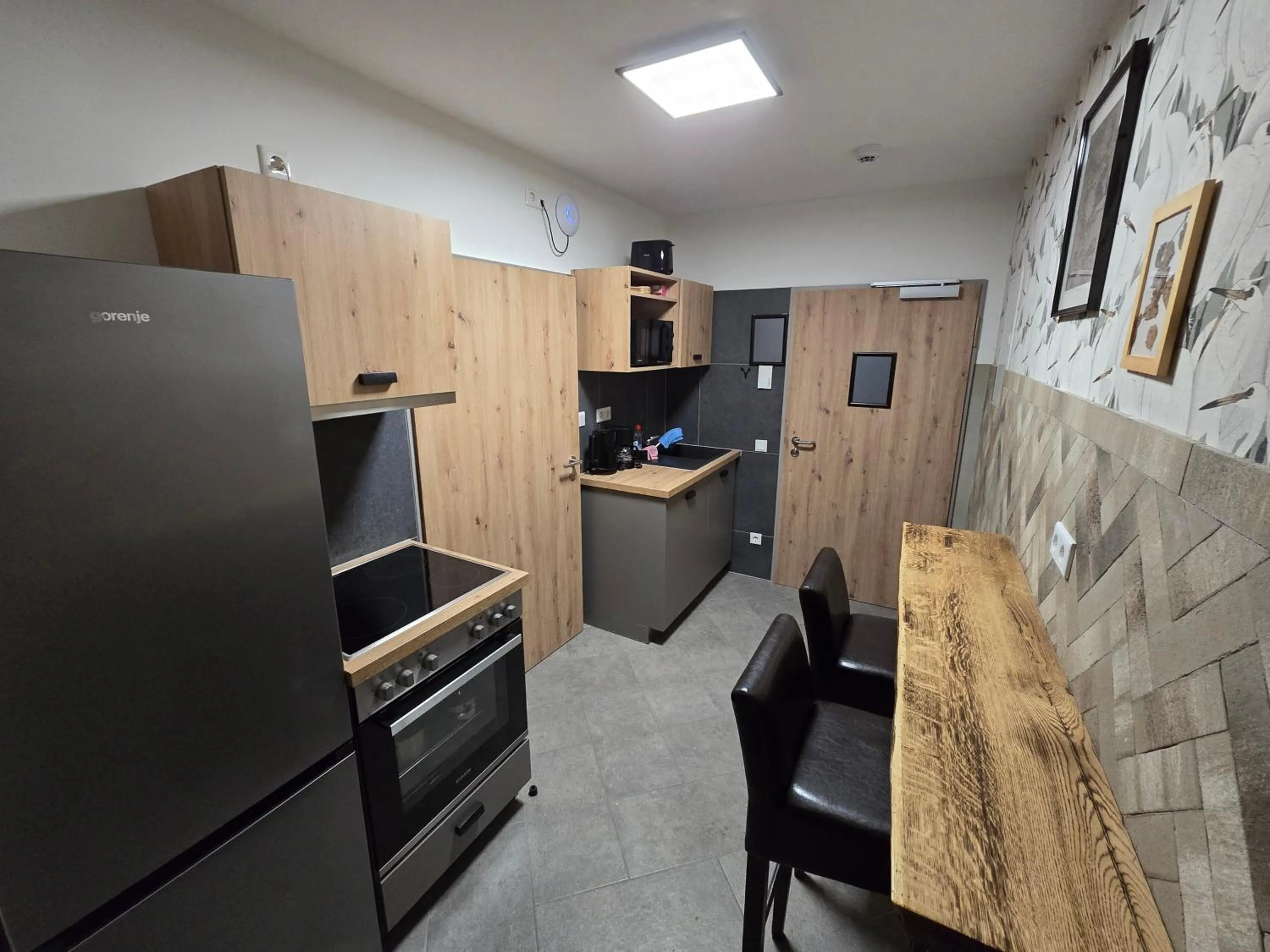Kitchen or kitchenette in Aparthotel Fairschlafen Minden
