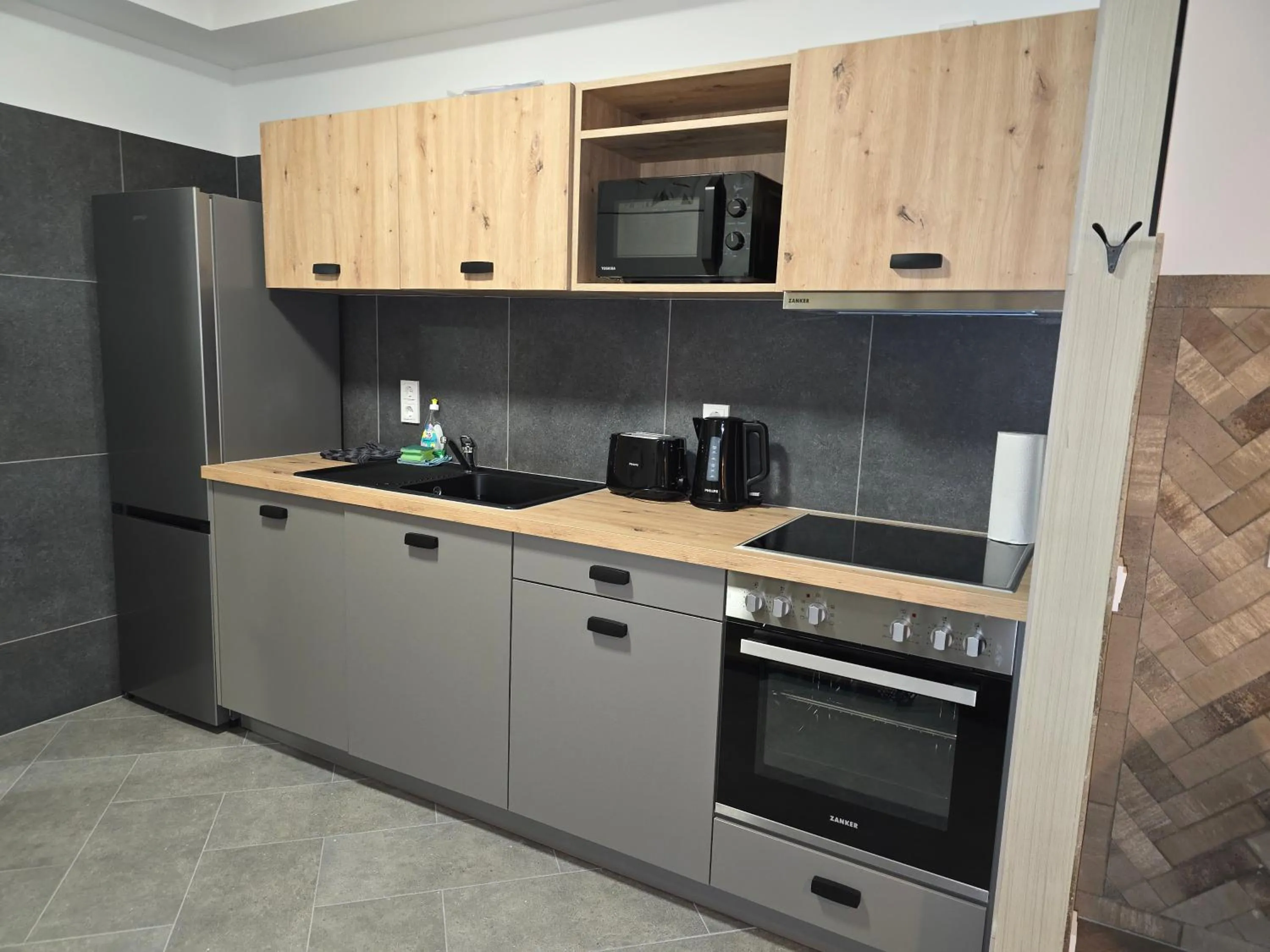 Kitchen or kitchenette in Aparthotel Fairschlafen Minden