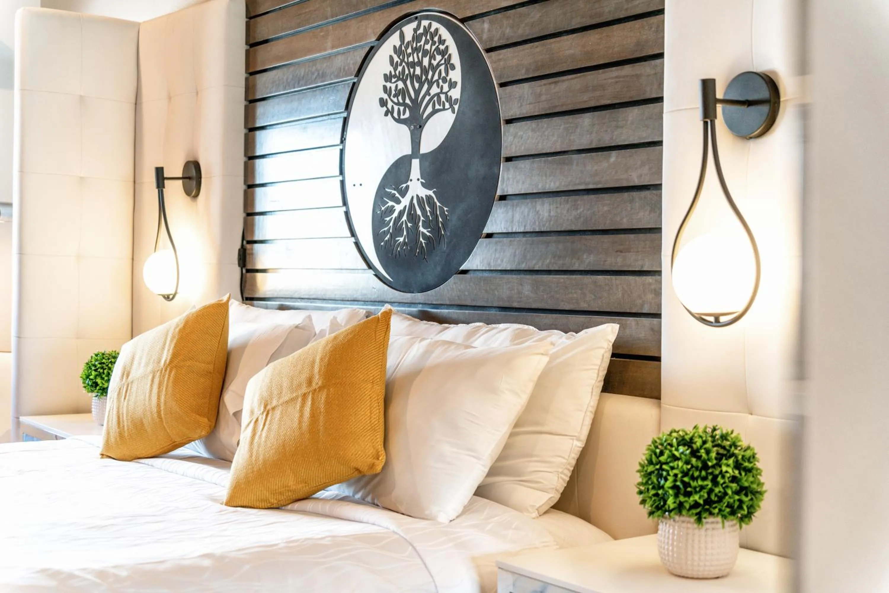 Bed in Aspire Inn Studios & Spas