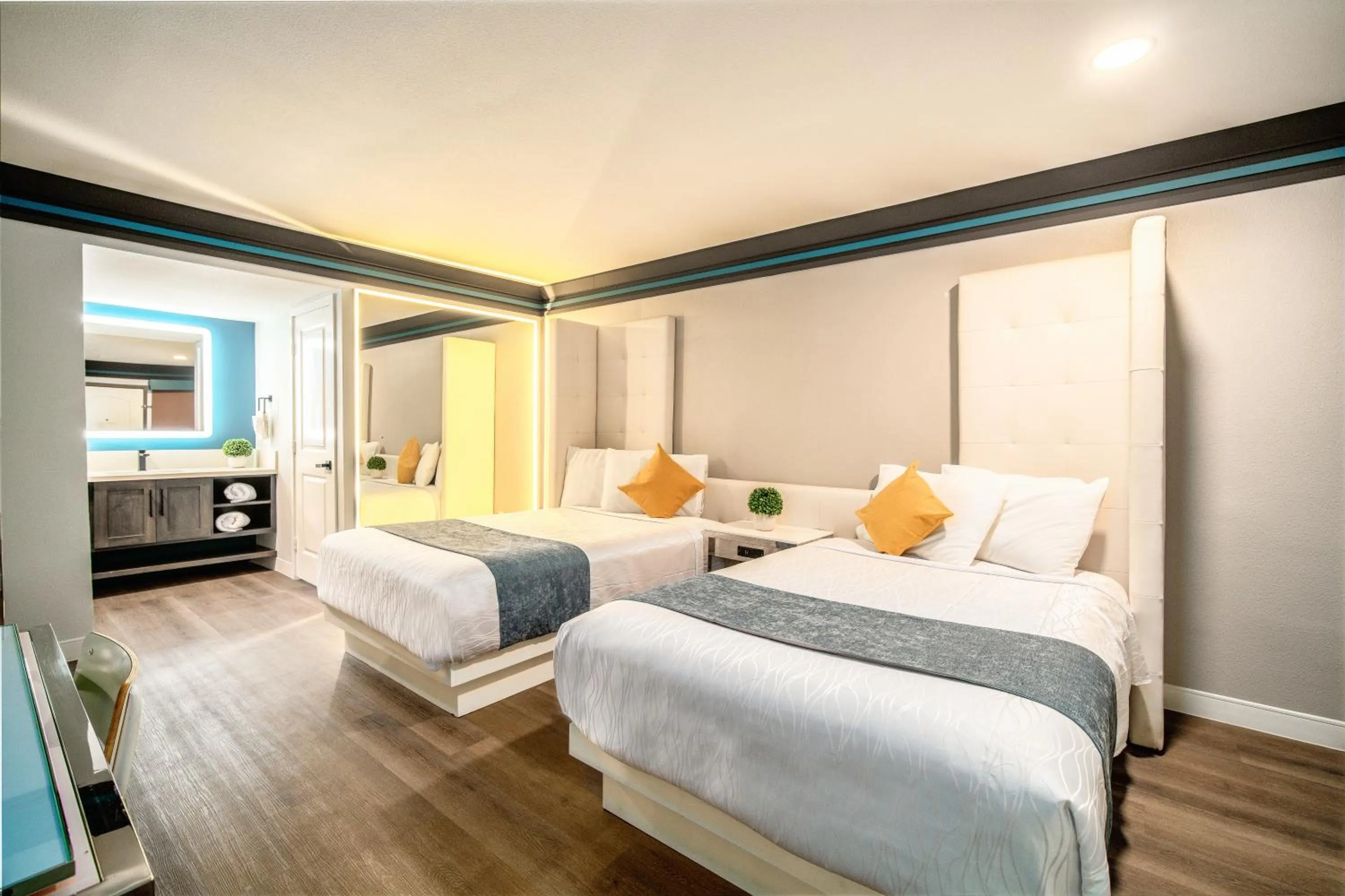 Bed in Aspire Inn Studios & Spas