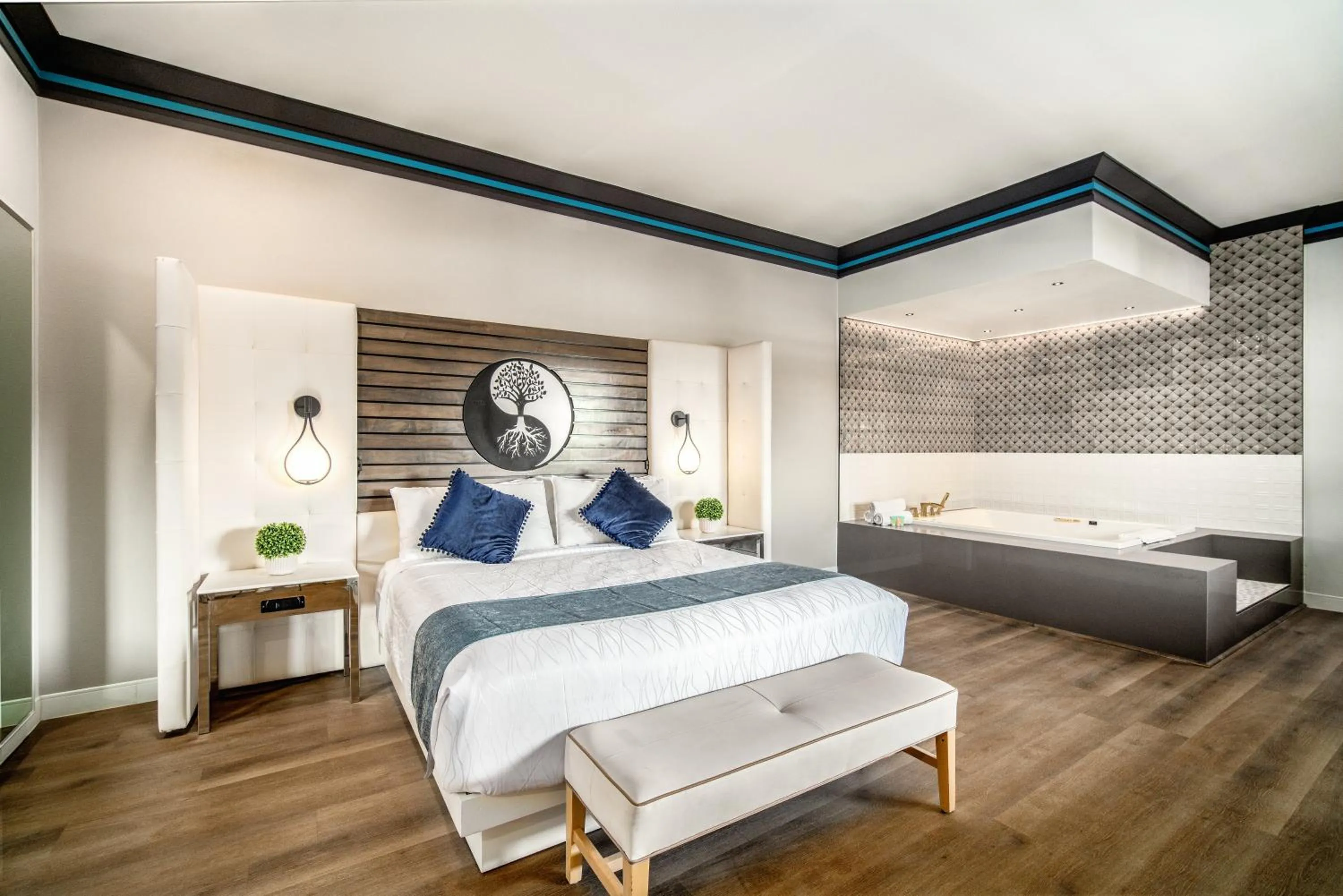 Bed in Aspire Inn Studios & Spas