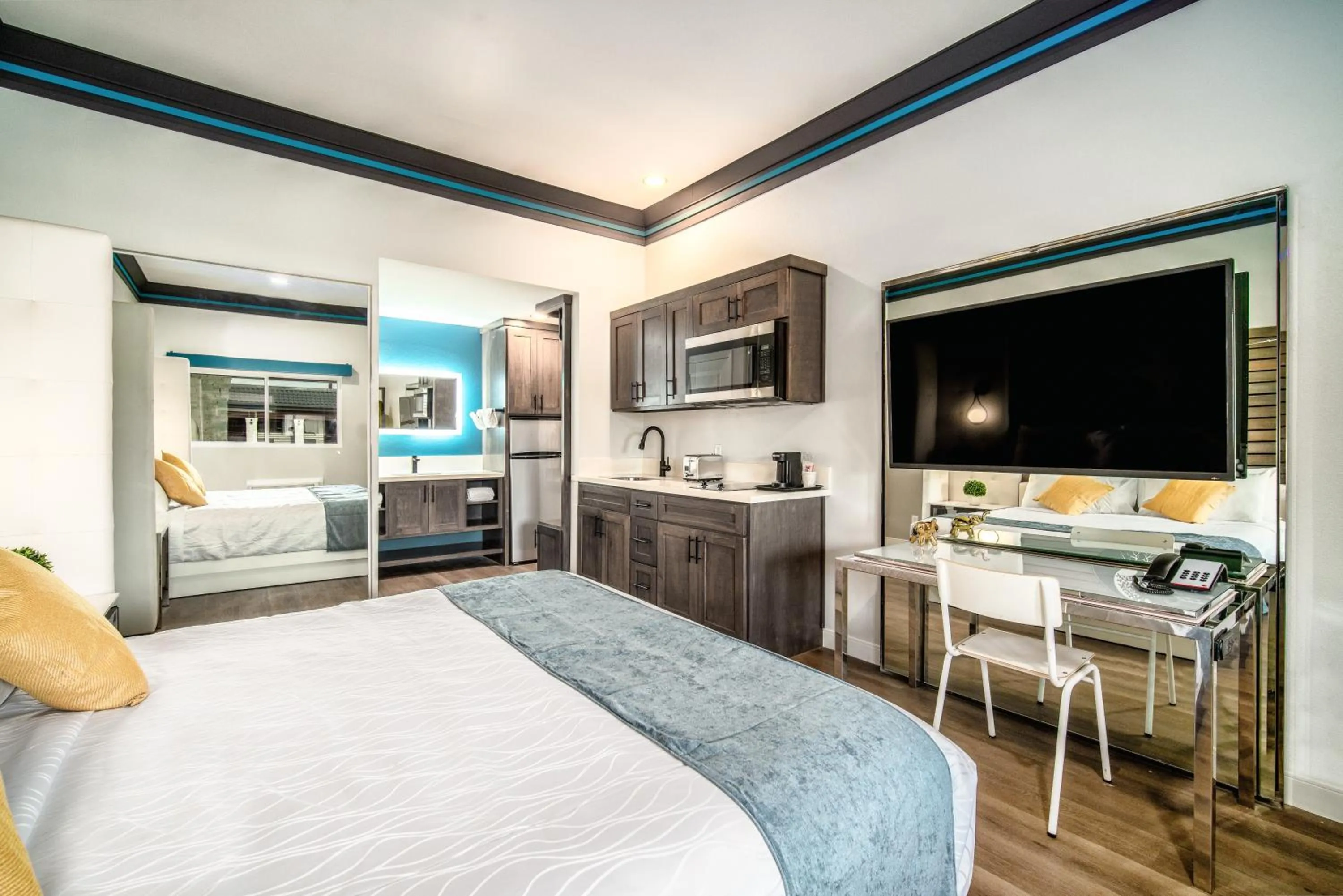 Bed in Aspire Inn Studios & Spas